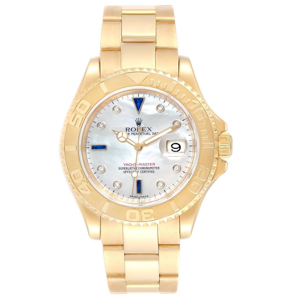 Rolex Yachtmaster Yellow Gold MOP Diamond Sapphire Serti Watch 16628. Officially certified chronometer self-winding movement. Rhodium-plated, oeil-de-perdrix decoration, straight-line lever escapement, freesprung monometallic balance adjusted to