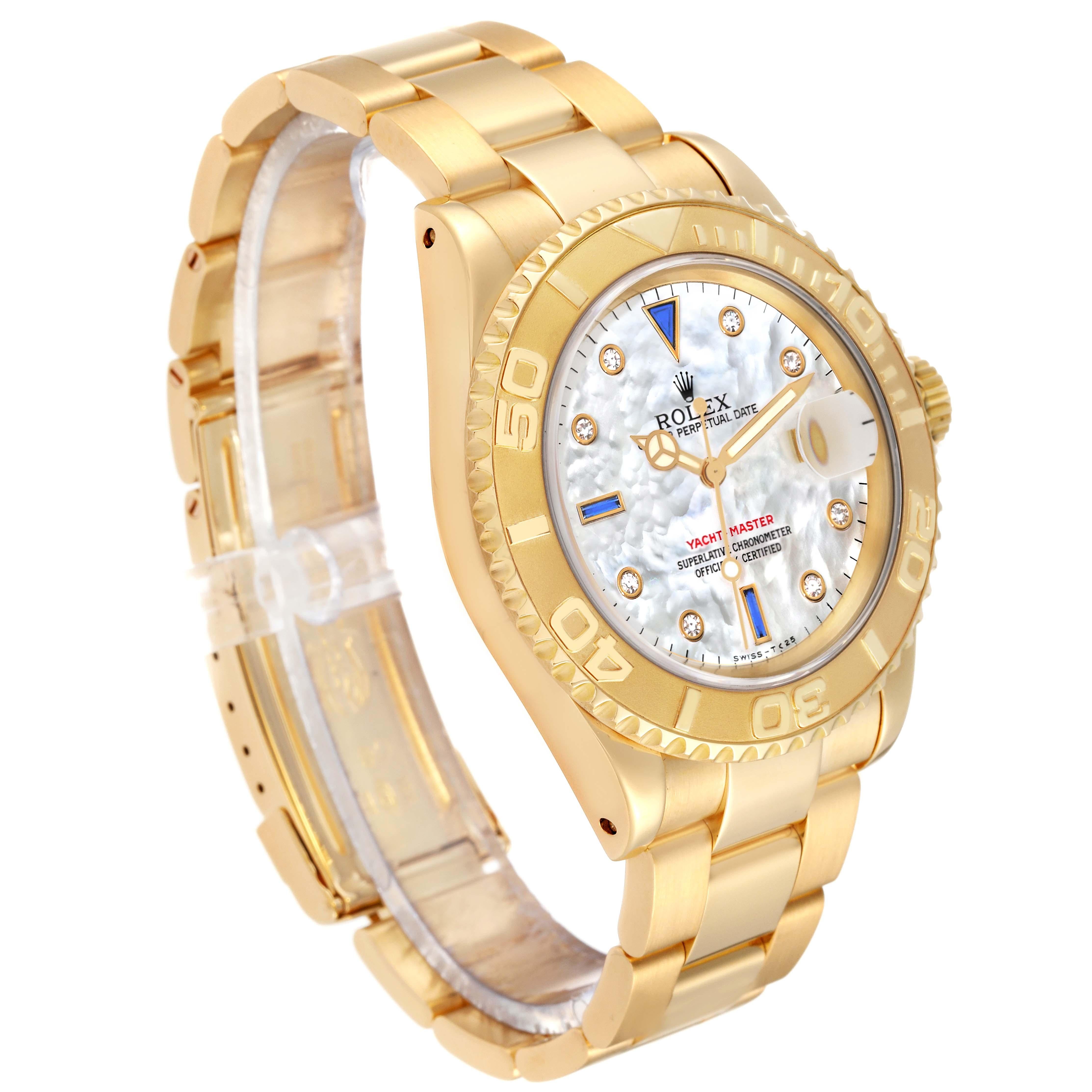 Rolex Yachtmaster Yellow Gold Mother of Pearl Diamond Sapphire Serti Mens Watch 16628. Officially certified chronometer automatic self-winding movement. Rhodium-plated, oeil-de-perdrix decoration, straight-line lever escapement, freesprung