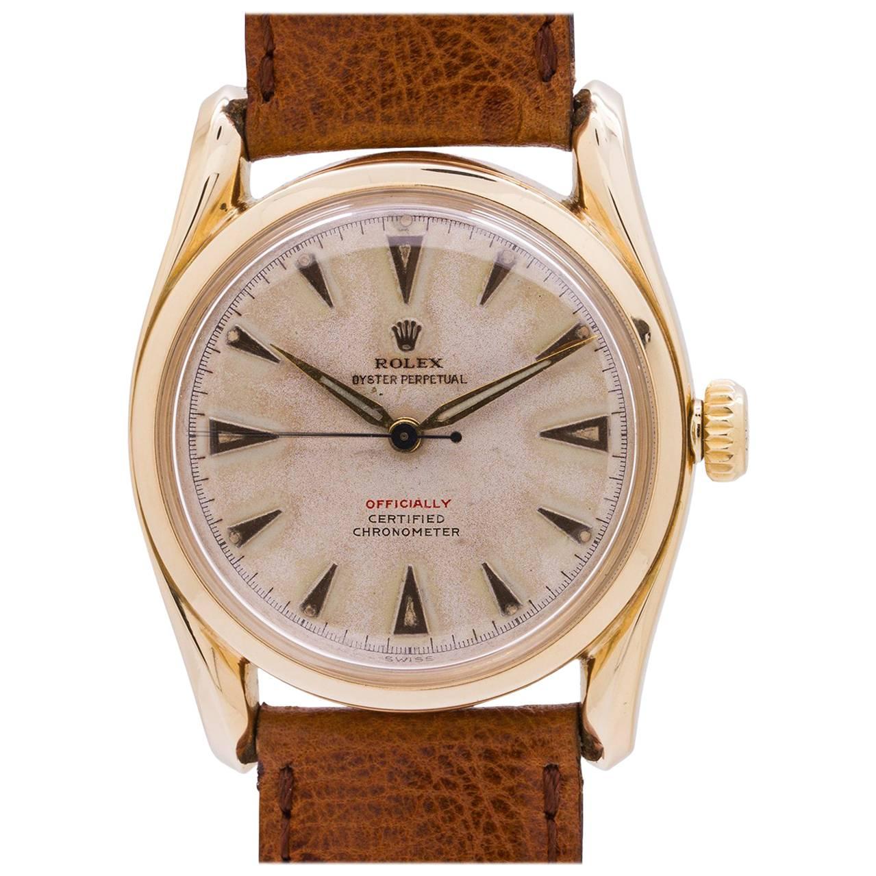 Rolex Yellow Gold Bombe Red Officially self winding wristwatch, circa 1951