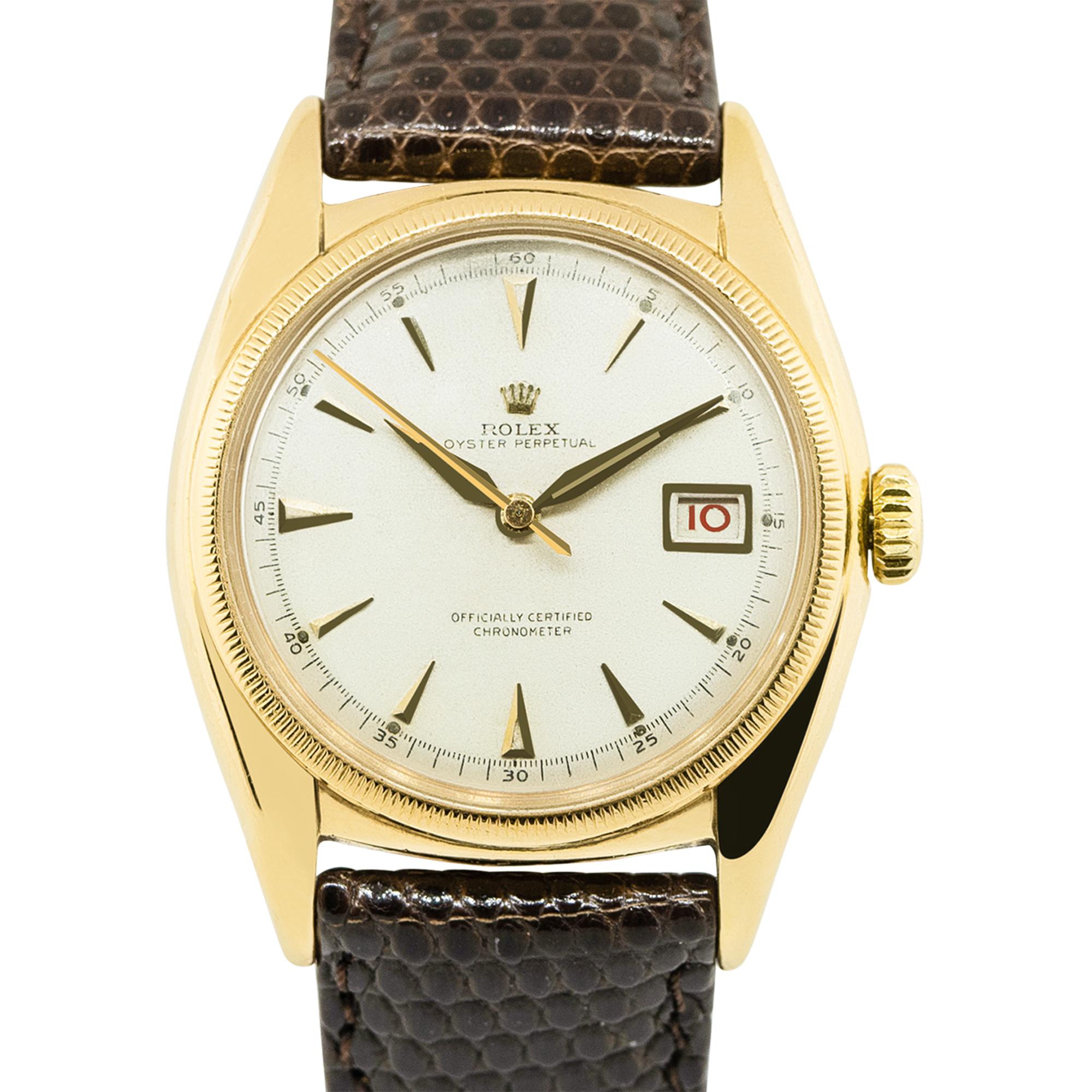 Rolex 6075 Bubble Back 18k Yellow Gold Vintage Watch
Brand: Rolex
Style: Oyster Perpetual Bubble Back
MPN: 6075
Serial Number: 600,000 Serial (From the 1950's)
Case Material: 18k Yellow Gold
Case Diameter: 36mm
Bezel: 18k Yellow Gold Fluted
