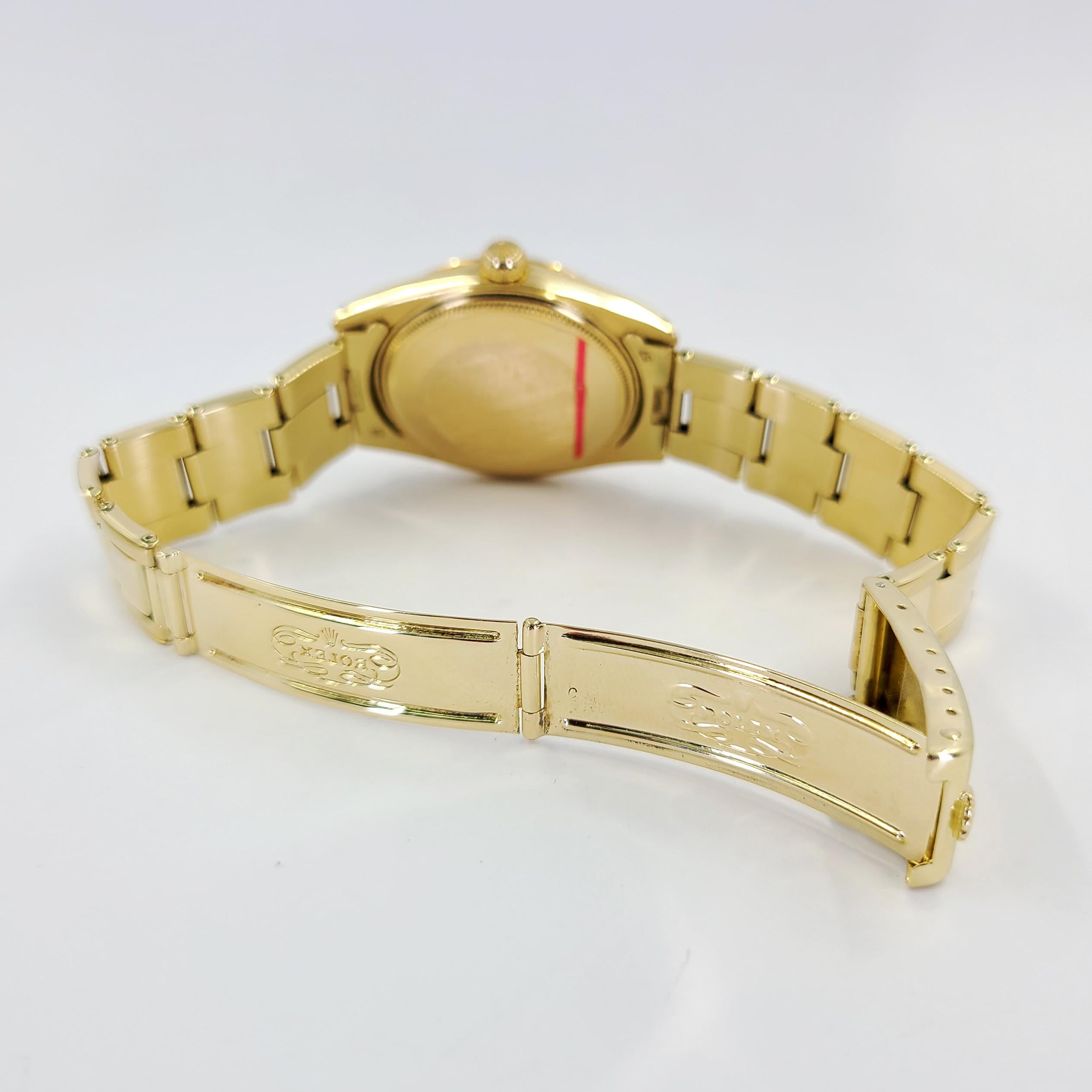 Montre-bracelet automatique Rolex à date en or jaune en vente 1