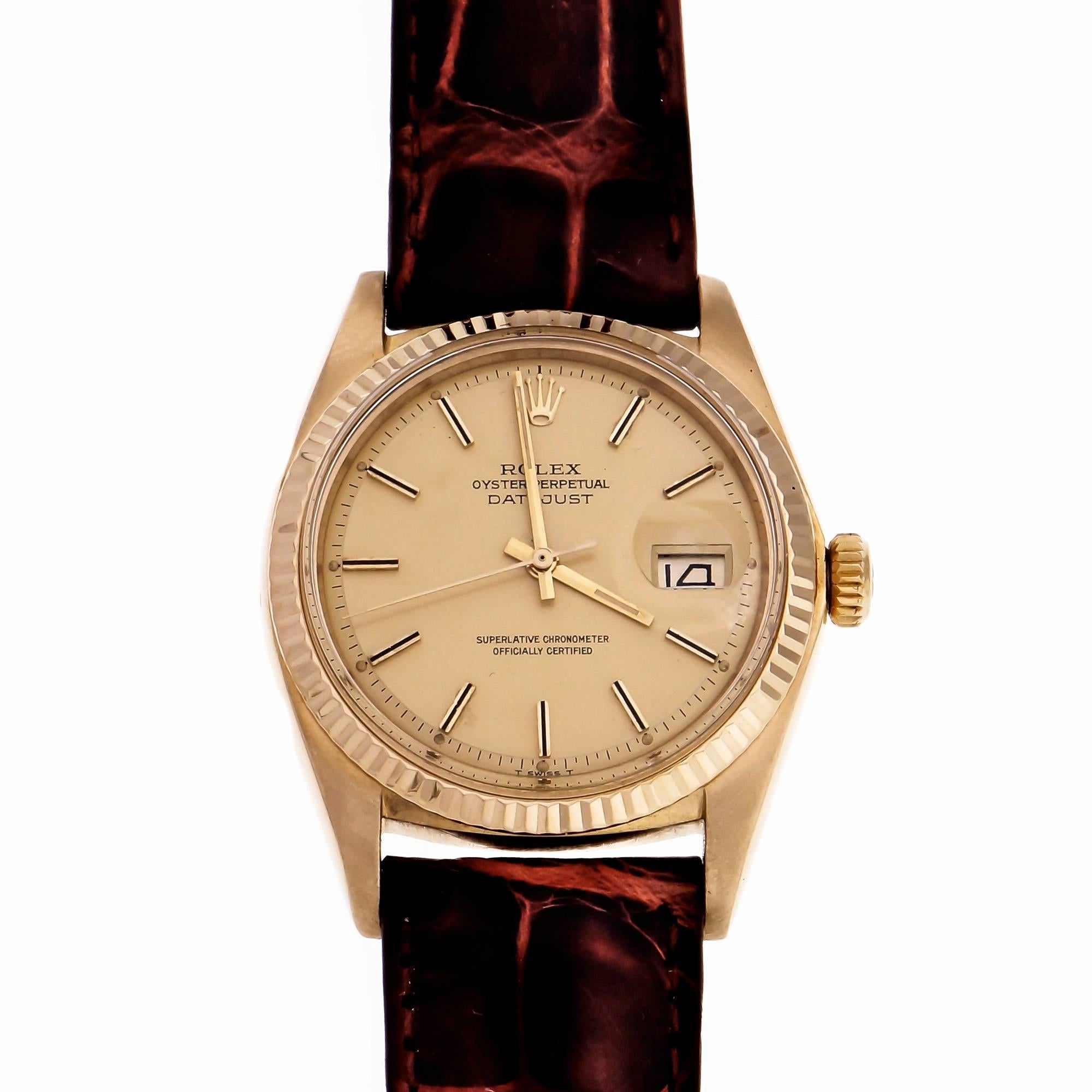 18k yellow gold Rolex Datejust Model 1601 circa 1970 collector’s quality with factory original pie pan dial and Rolex 18k yellow gold buckle. New Italian alligator band.  

14k yellow gold 
62.1 grams 
Length: 44mm 
Width: 36mm 
Band width at case: