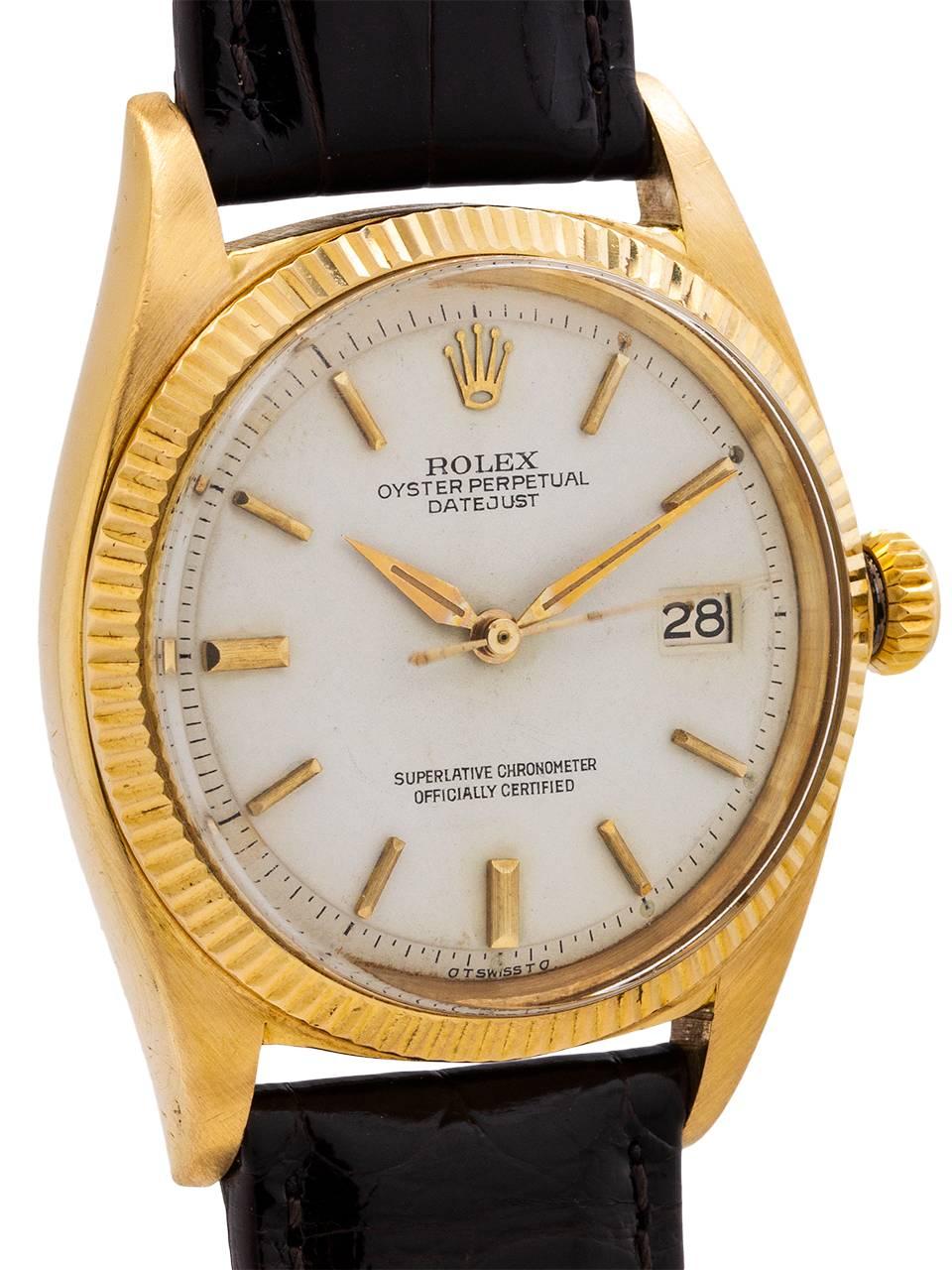 
Rolex 18K yellow gold Datejust ref 1601 serial number 580,xxx circa 1960. Featuring 36mm diameter Oyster case with fluted bezel, acrylic crystal and beautiful condition original white dial with applied gold stick indexes, Rolex crown logo and gilt