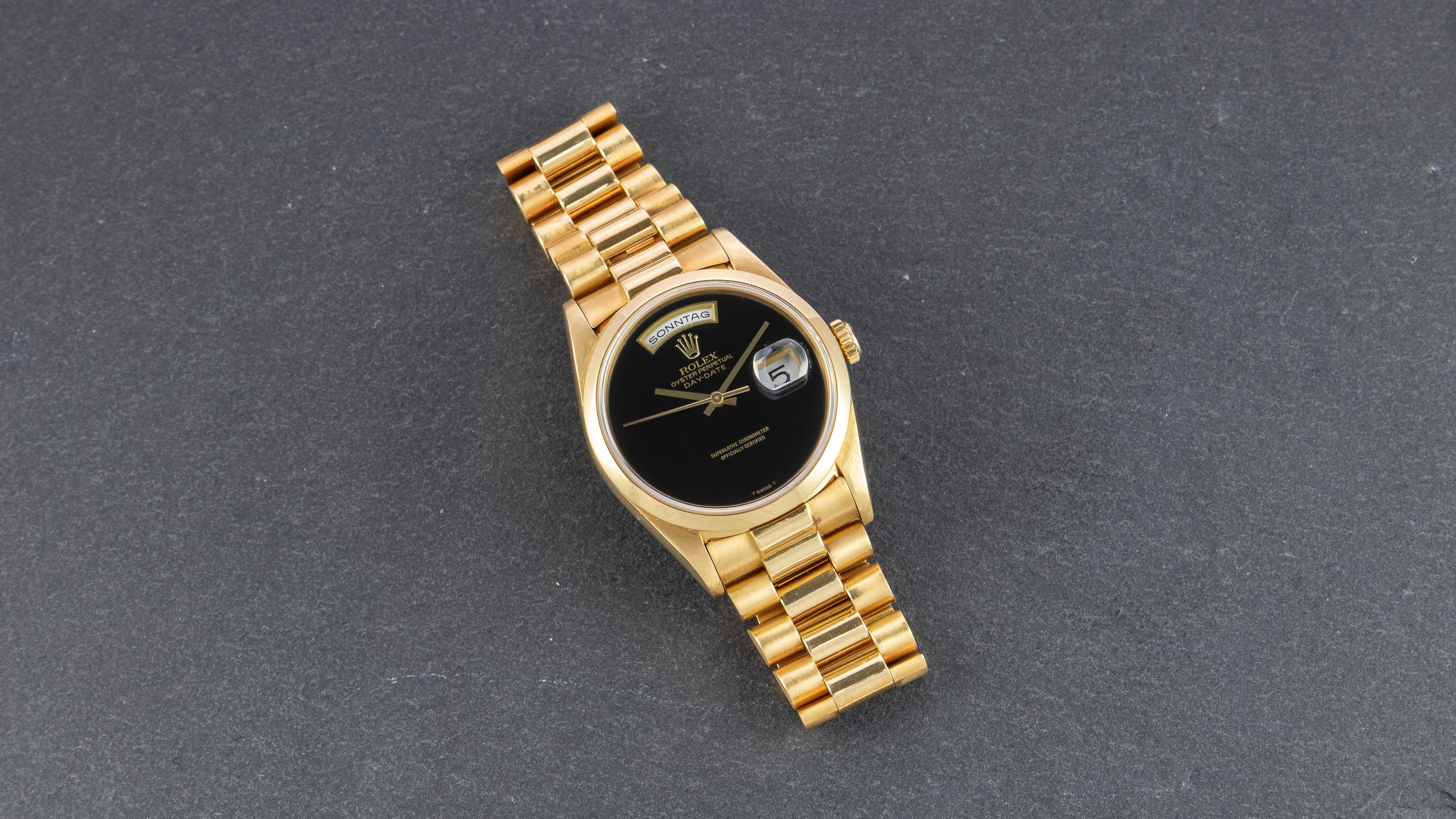 Rolex Yellow Gold Day-Date Black Onyx Dial President Wristwatch, 1990s In Good Condition For Sale In New York, NY
