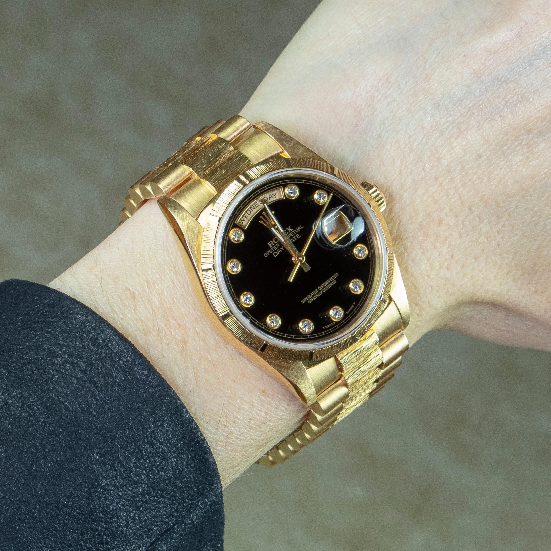 Rolex Yellow Gold Day-Date Black Onyx Serti Dial President Watch, Box and Papers In Good Condition For Sale In New York, NY