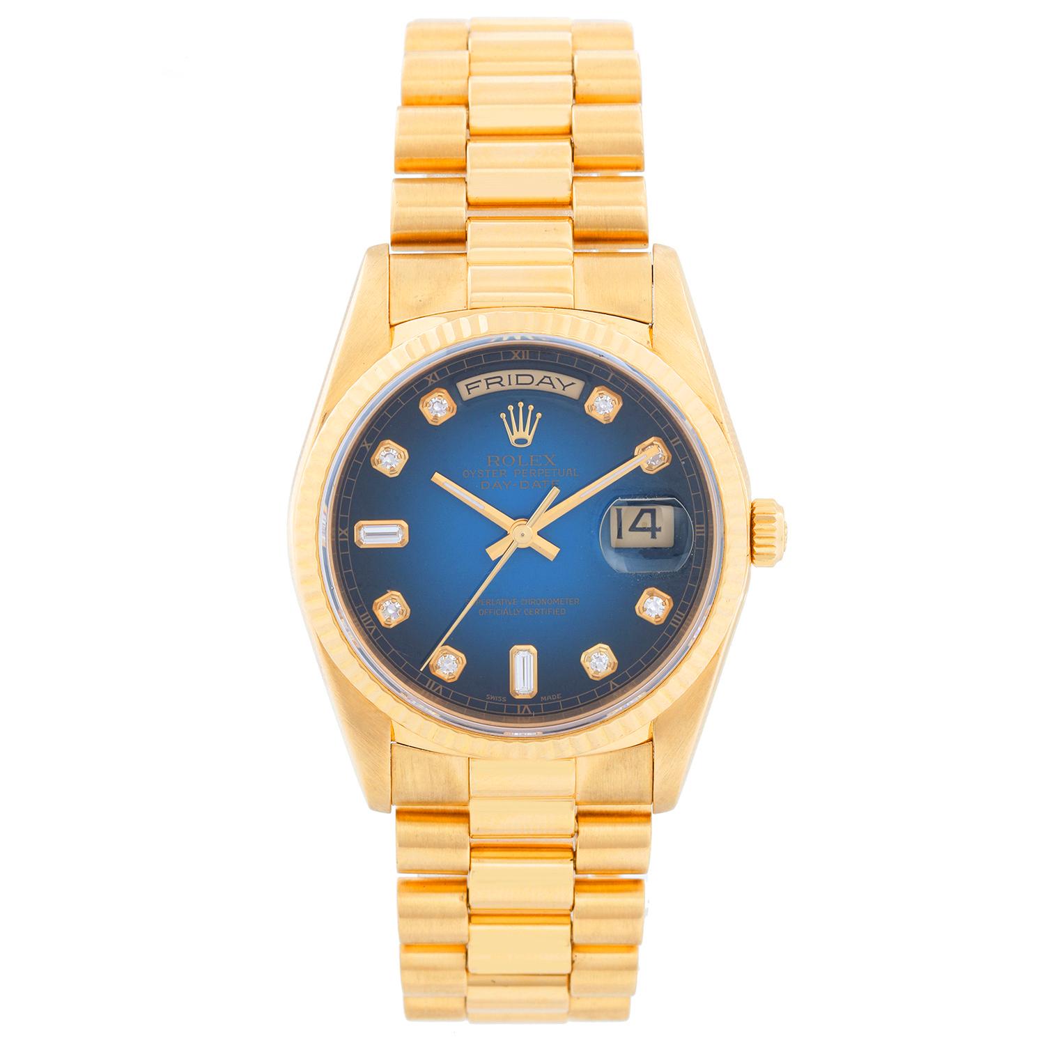 Rolex President Day-Date Men's 18k Gold Watch 18238 -  Automatic winding; quick-set; sapphire crystal. 18k yellow gold case with Fluted bezel (36mm diameter). Blue vignette diamond dial. 18k yellow gold hidden-clasp President bracelet. Pre-owned