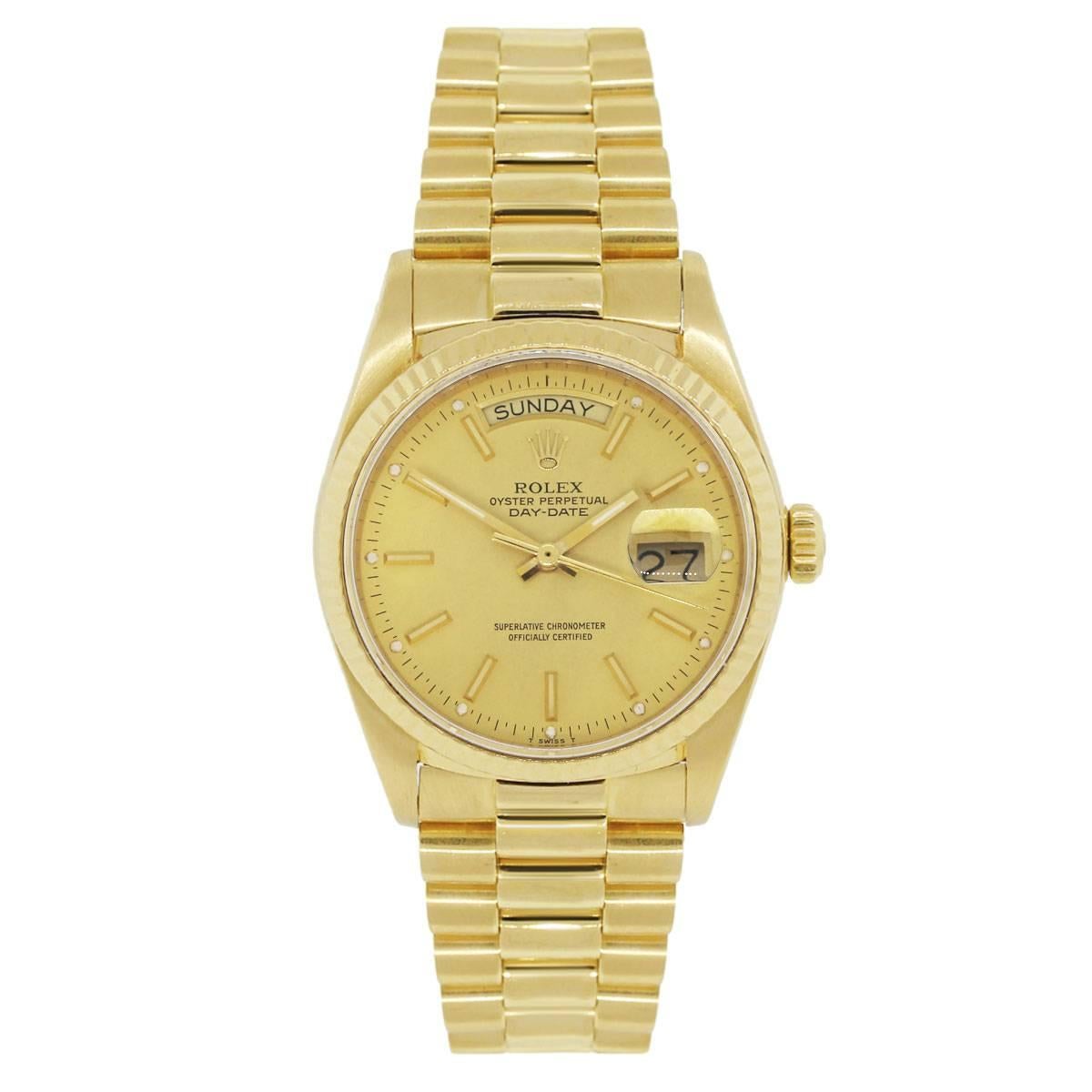 Brand: Rolex
MPN: 18038
Model: Day Date
Case Material: 18k yellow gold
Case Diameter: 36mm
Crystal: Scratch resistant sapphire
Bezel: 18k yellow gold fluted bezel (factory)
Dial: Champagne stick dial with gold hour markers and hands, day and date