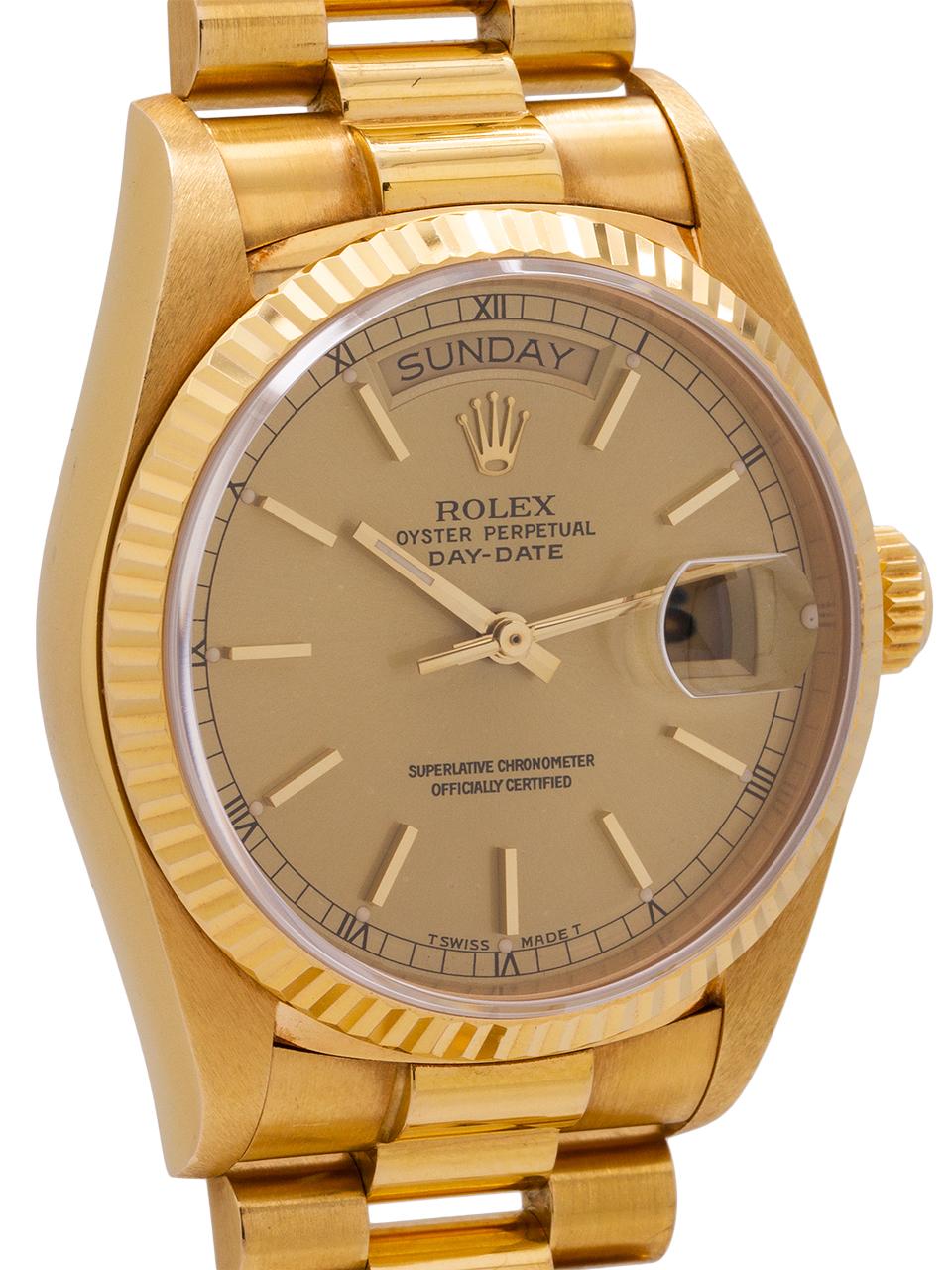 Rolex 18K YG Day Date ref 18038 serial # 9.8 million, circa 1987 in exceptional, totally unpolished condition. Featuring a 36mm diameter case with fluted bezel, sapphire crystal, and classic original champagne gold dial. Powered by calibre 3055 self