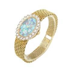 Rolex Yellow Gold Diamond and Opal Dial Ladies Manual Wind Wristwatch