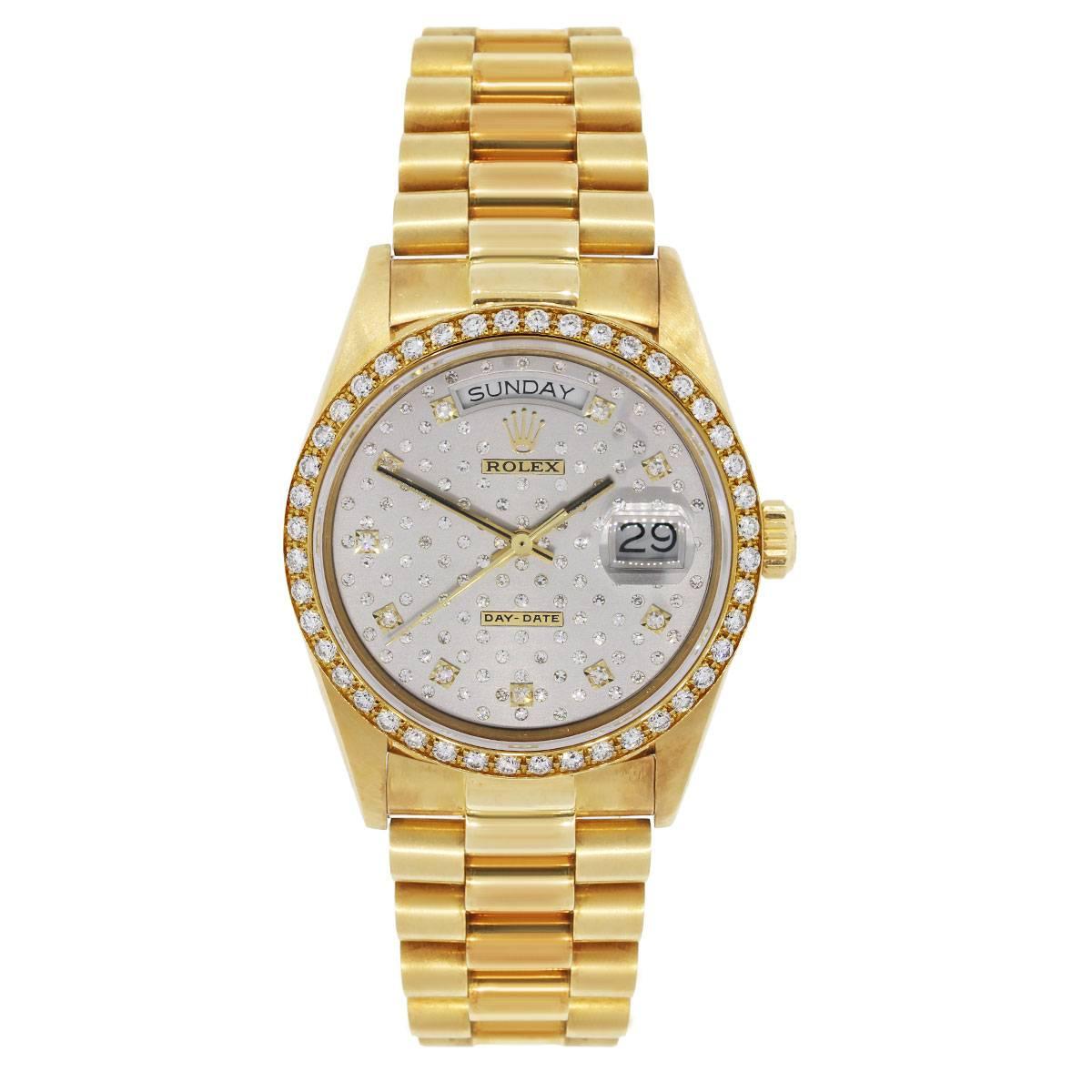 Brand: Rolex
MPN: 18038
Model: Day-Date
Case Material: 18k yellow gold
Case Diameter: 36mm
Crystal: Scratch resistant sapphire
Bezel: Round brilliant diamond bezel (factory)
Dial: Very rare silver pleade diamond dial with day and date window