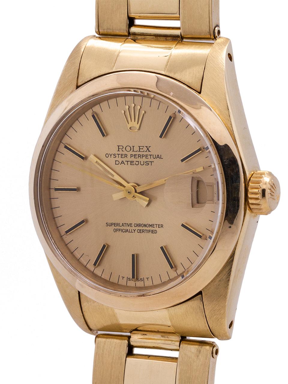 
Rolex midsize Datejust 18K YG ref 6827 case serial # 6.7 million circa 1981. Featuring 31mm diameter case with smooth bezel, acrylic crystal and original champagne dial with applied gold indexes and gold baton hands. Powered by self winding caliber