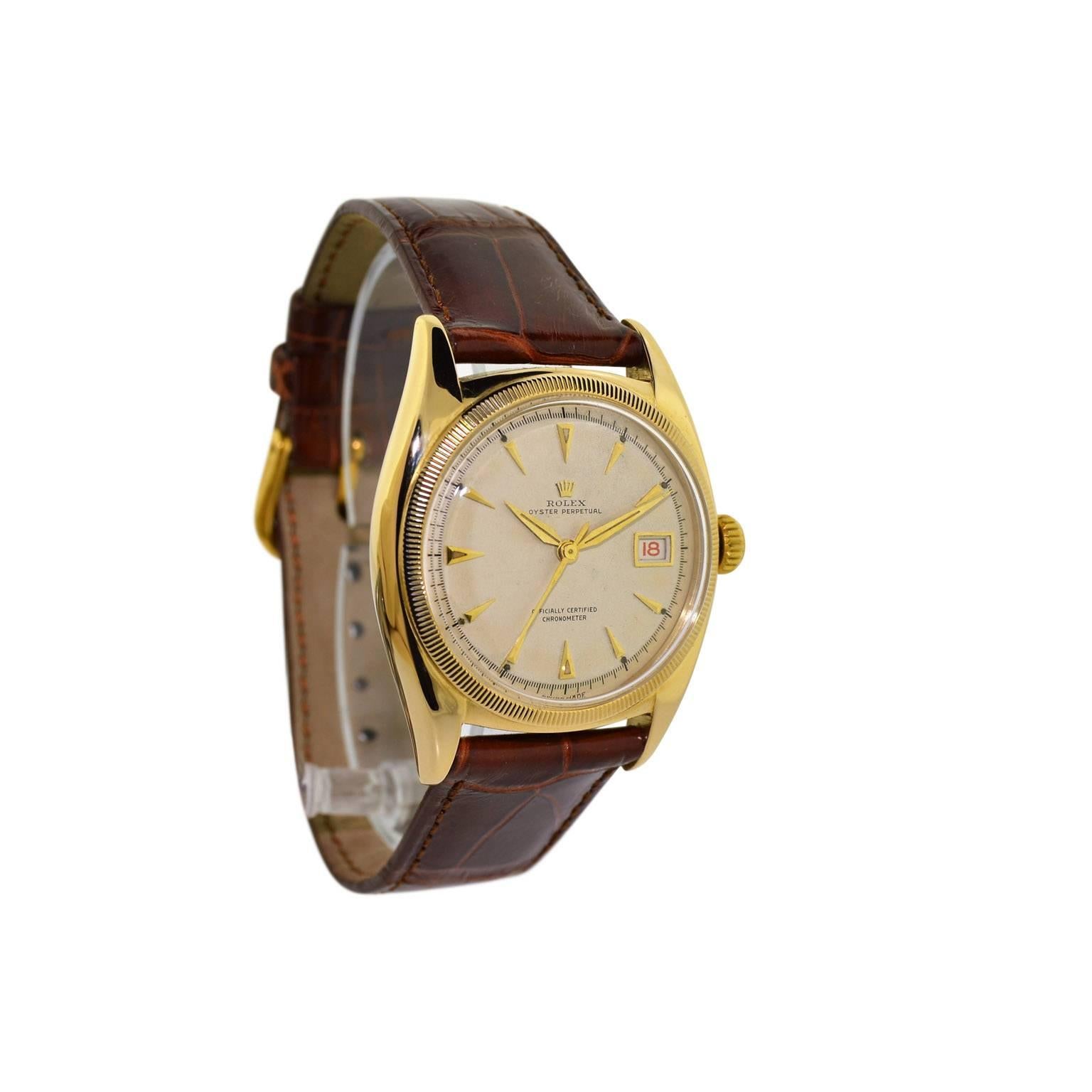 FACTORY / HOUSE: Rolex Watch Company
STYLE / REFERENCE: Ovettone / Full Size / Ref. 6075 
METAL / MATERIAL: 18Kt. Solid Yellow Gold
CIRCA: 1949 / 1950
DIMENSIONS: 44mm X 36mm
MOVEMENT / CALIBER: Perpetual Winding / 18 Jewels / Ref. 745 Full Size