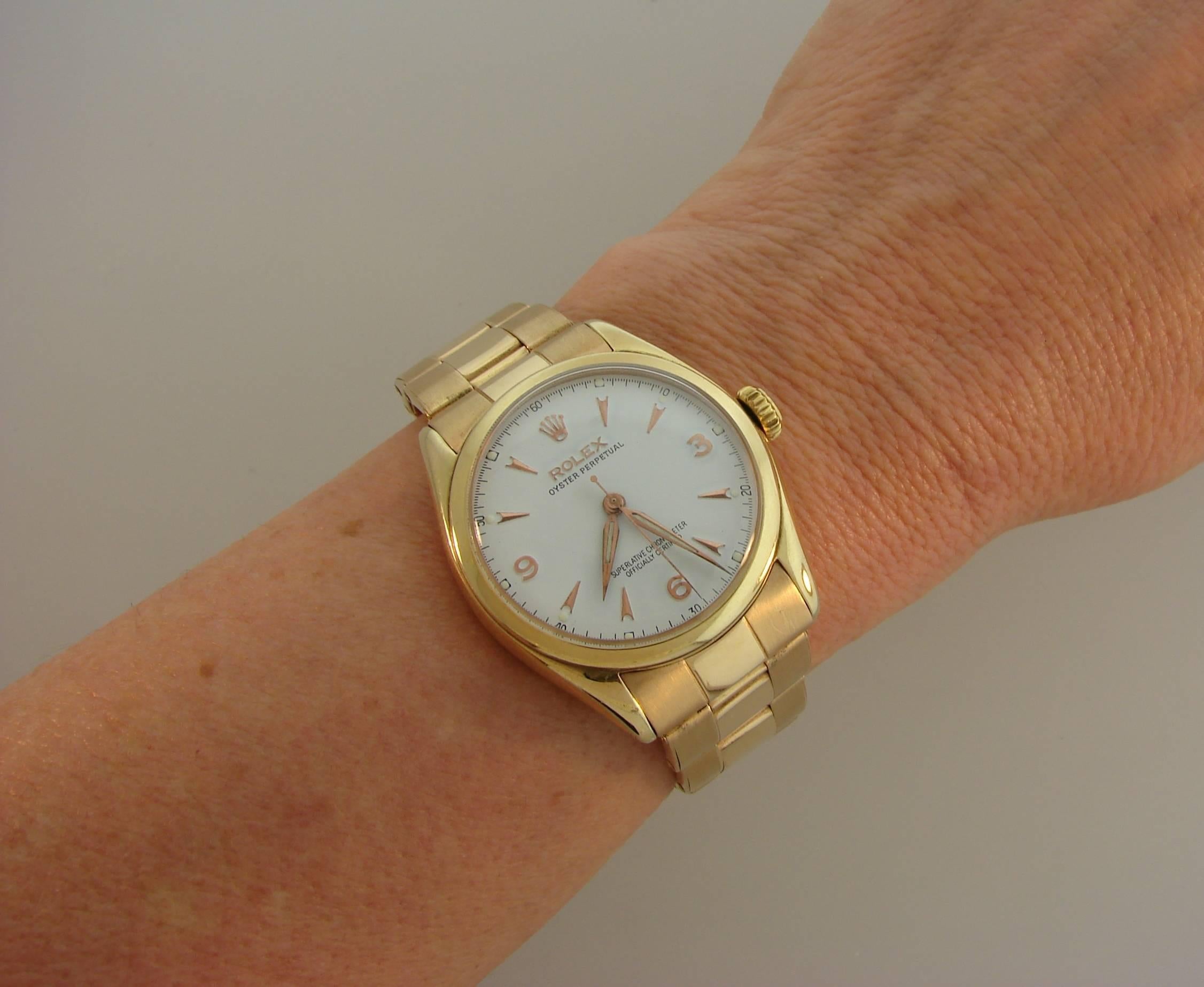 Classy vintage yellow gold Rolex Oyster Perpetual watch. Hot and desirable, it is a great addition to your watch and jewelry collection.  34 mm case, Swiss made, 18 jewels, certified chronometer, automatic movement. All parts are original Rolex. One