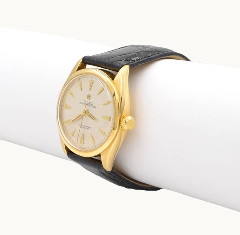 Women's or Men's Rolex yellow Gold Oyster Perpetual Wristwatch Ref 6084, circa 1962 For Sale