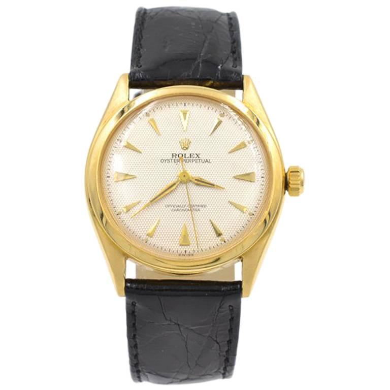 Rolex yellow Gold Oyster Perpetual Wristwatch Ref 6084, circa 1962 For Sale