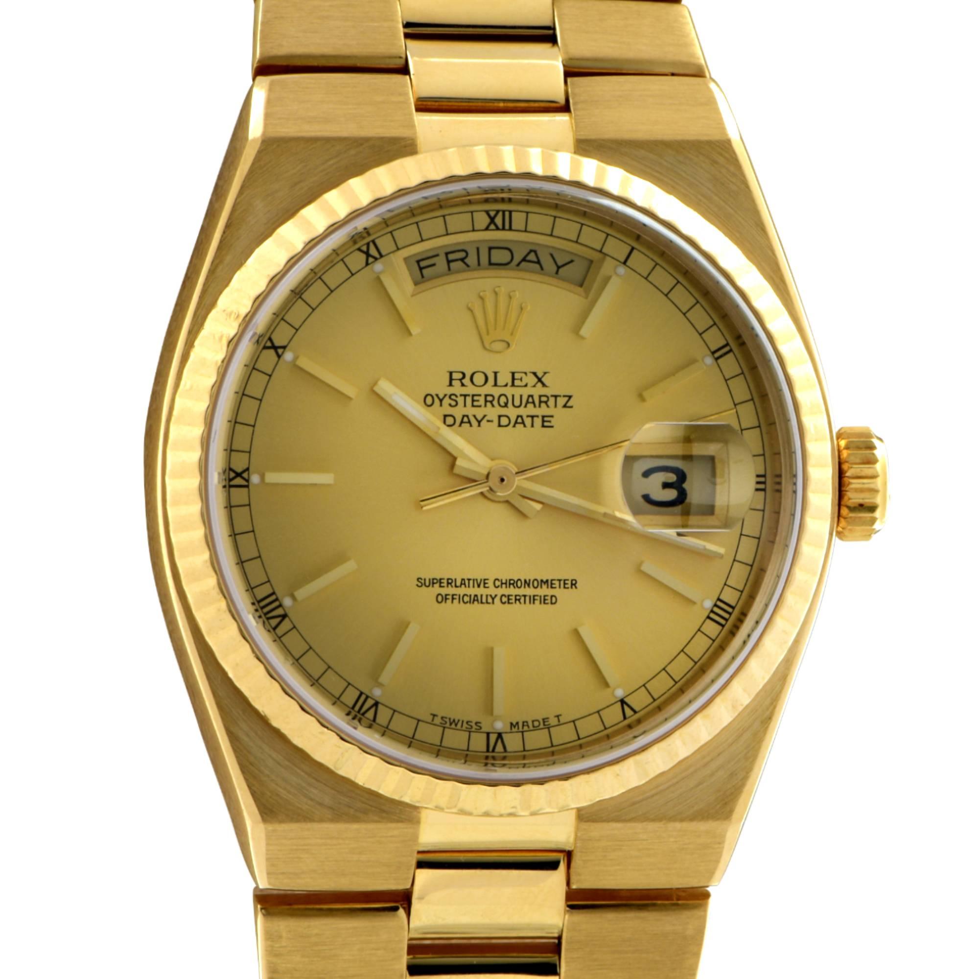 Rolex Oysterquartz Day-Date (19018), Circa 1979, quartz watch, features a 36mm 18k yellow gold case and bracelet with fluted bezel surrounding a gold dial. Functions include hours, minutes, seconds, day and date. Rolex, a true house hold name that