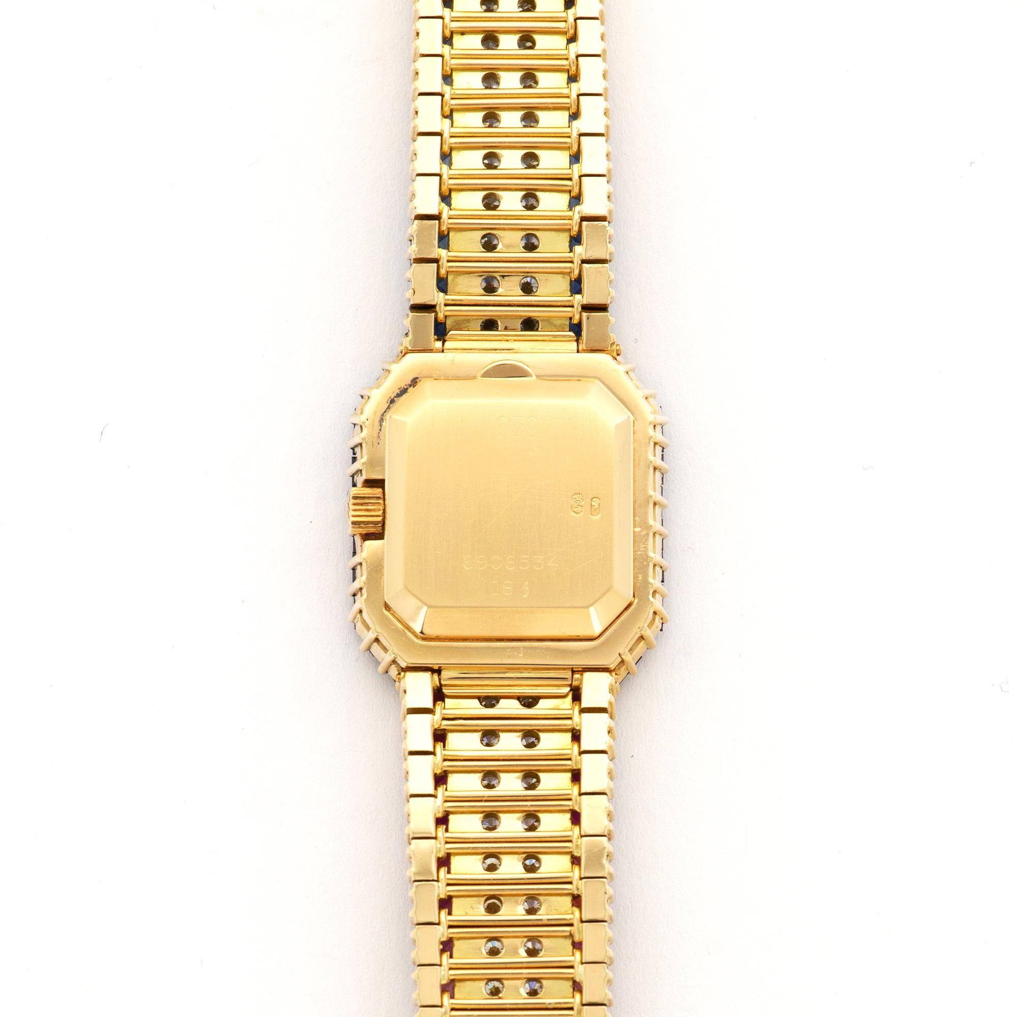 rolex yellow gold rainbow diamond & sapphire watch