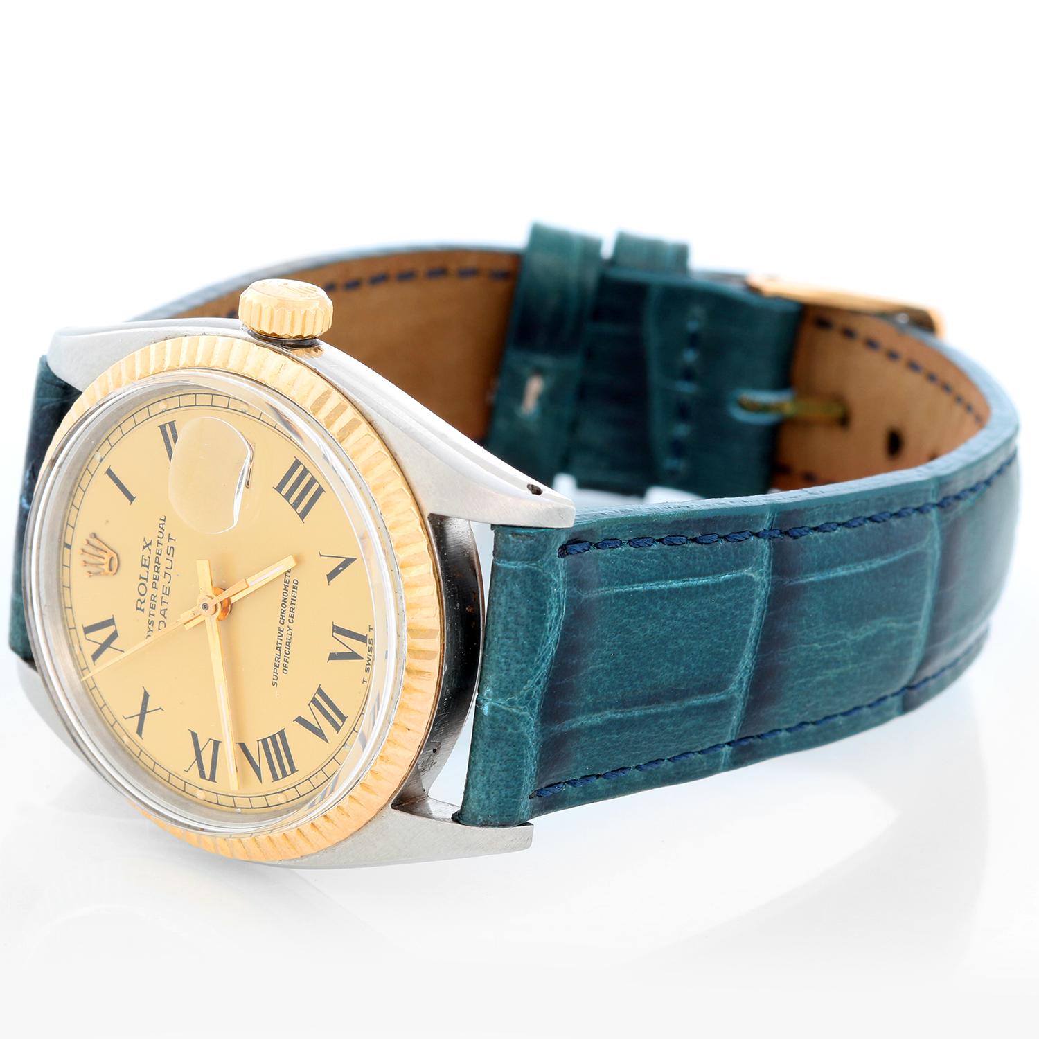 Rolex Datejust Men's 2-Tone Watch 1601 on Strap  - Automatic winding, 26 jewels, acrylic crystal, non-quickset. Stainless steel case with 18k yellow gold fluted bezel. Champagne dial with painted roman numerals .  Leather strap with tang buckle.