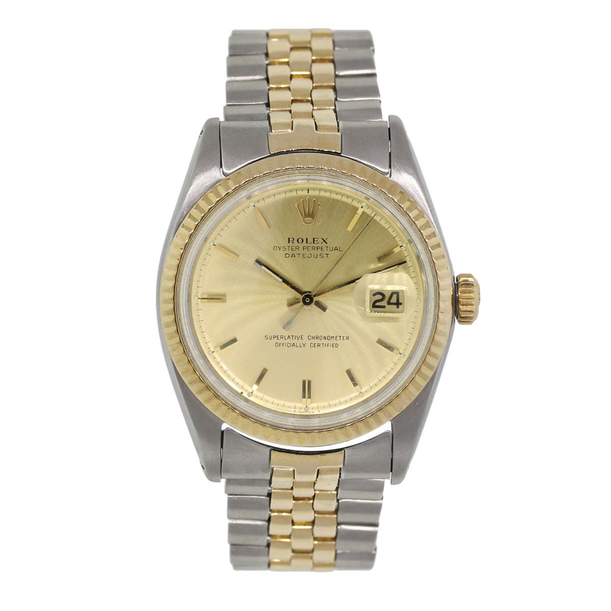 Brand: Rolex
MPN: 1601
Model: Datejust
Case Material: Stainless Steel
Case Diameter: 36mm
Crystal: Plastic crystal
Bezel: 18k yellow gold fluted bezel
Dial: Champagne pie pan dial with date window at the 3 o’clock position
Bracelet: 18k yellow gold