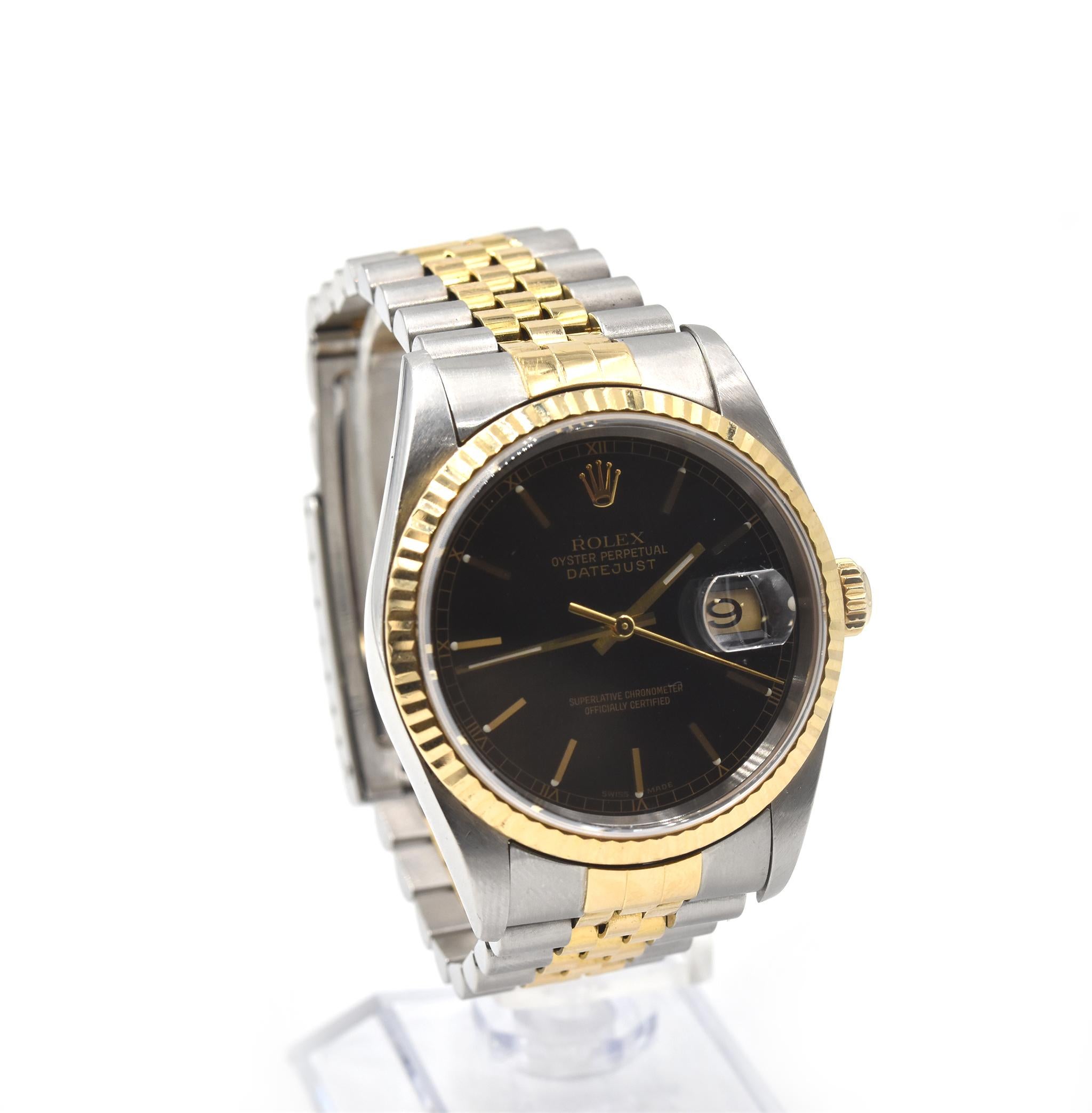 Movement: automatic
Function: hours, minutes, seconds, date
Case: round 36mm stainless steel case, 18k yellow gold fluted bezel, scratch resistant sapphire crystal, 18k yellow gold screw-down crown, water resistant to 100 meters
Dial: black dial