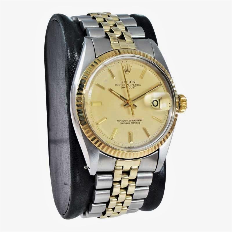 FACTORY / HOUSE: Rolex Watch Company
STYLE / REFERENCE: Datejust / Ref. 1601
METAL / MATERIAL: 14Kt. Solid Gold / Stainless Steel 
DIMENSIONS: 42mm X 36mm
CIRCA: 1979 / 1980
MOVEMENT / CALIBER: Perpetual Winding / 26 Jewels / Cal. 1570 
DIAL /