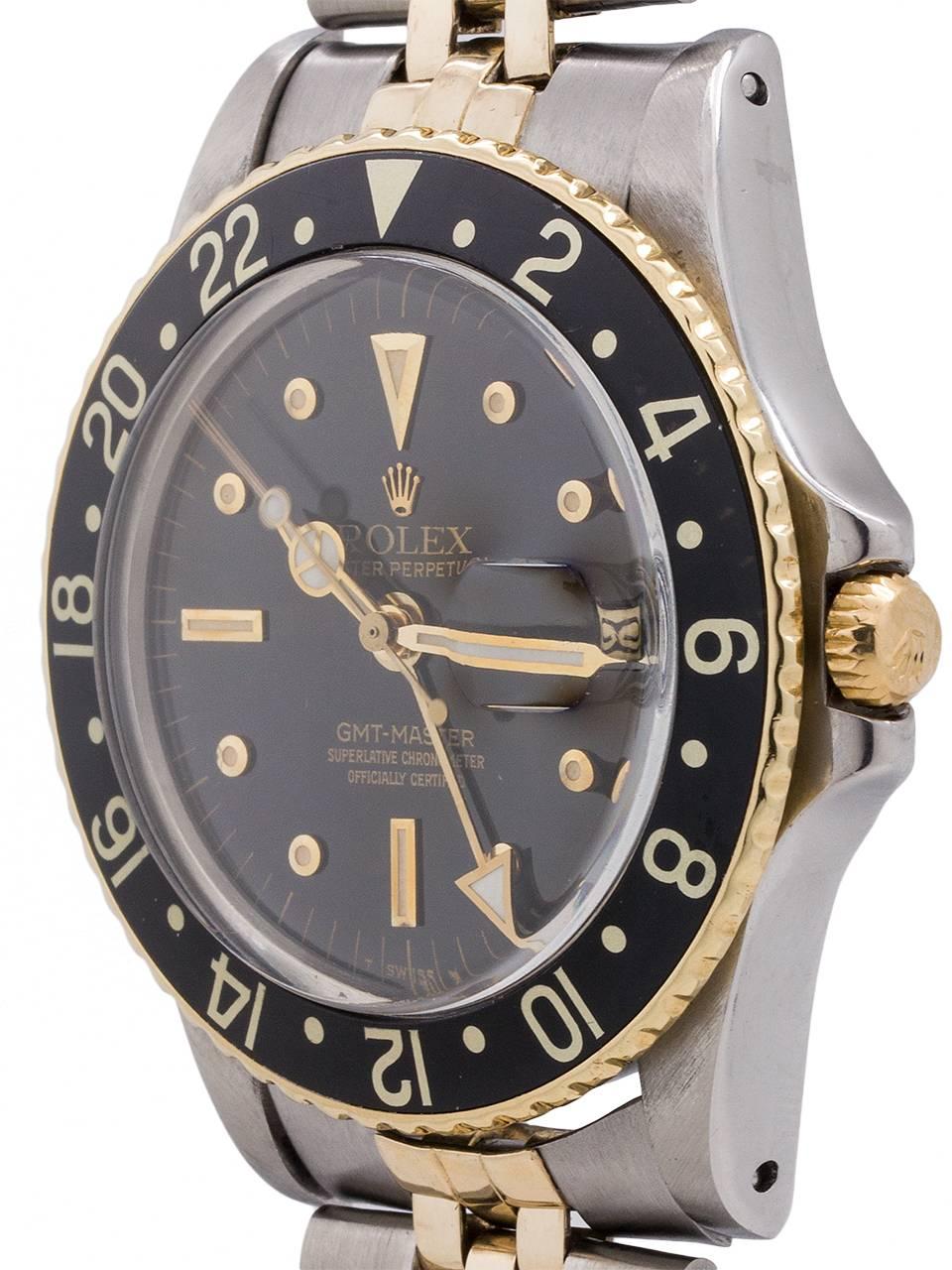 
Great looking and popular vintage Rolex ref# 1675 GMT stainless steel and 14K YG case serial # 5.8 million circa 1979. This is the steel and gold version of the famous 1675 GMT. Featuring a 40mm diameter case with bi-directional 24 hour black bezel