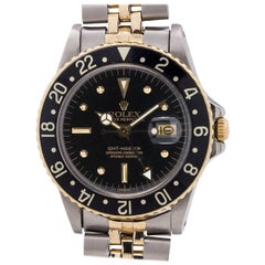 Rolex Yellow Gold Stainless Steel GMT self winding wristwatch, circa 1978 - 79