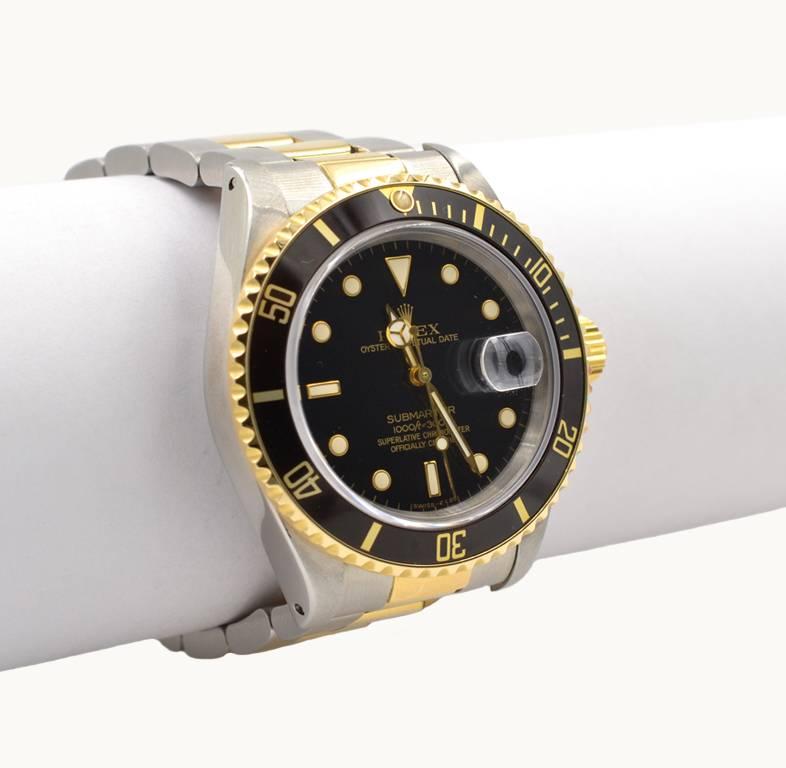 Women's or Men's Rolex yellow gold Stainless Steel Submariner black dial Wristwatch Ref 16803 For Sale