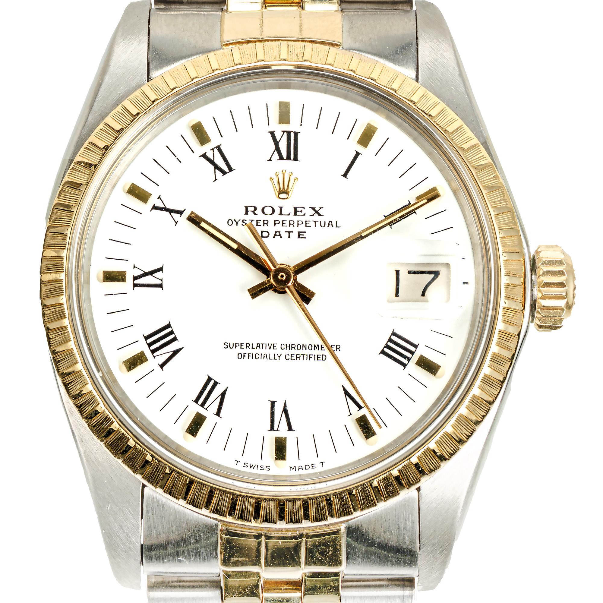 1977 original Rolex 1505, 14k yellow gold and steel wristwatch. Original white dial with roman numerals and raised gold cube markers. 8 inch jubilee band. Fully serviced with one year warranty.

Length: 42mm
Width: 34mm
Band width at case: 19mm
Case