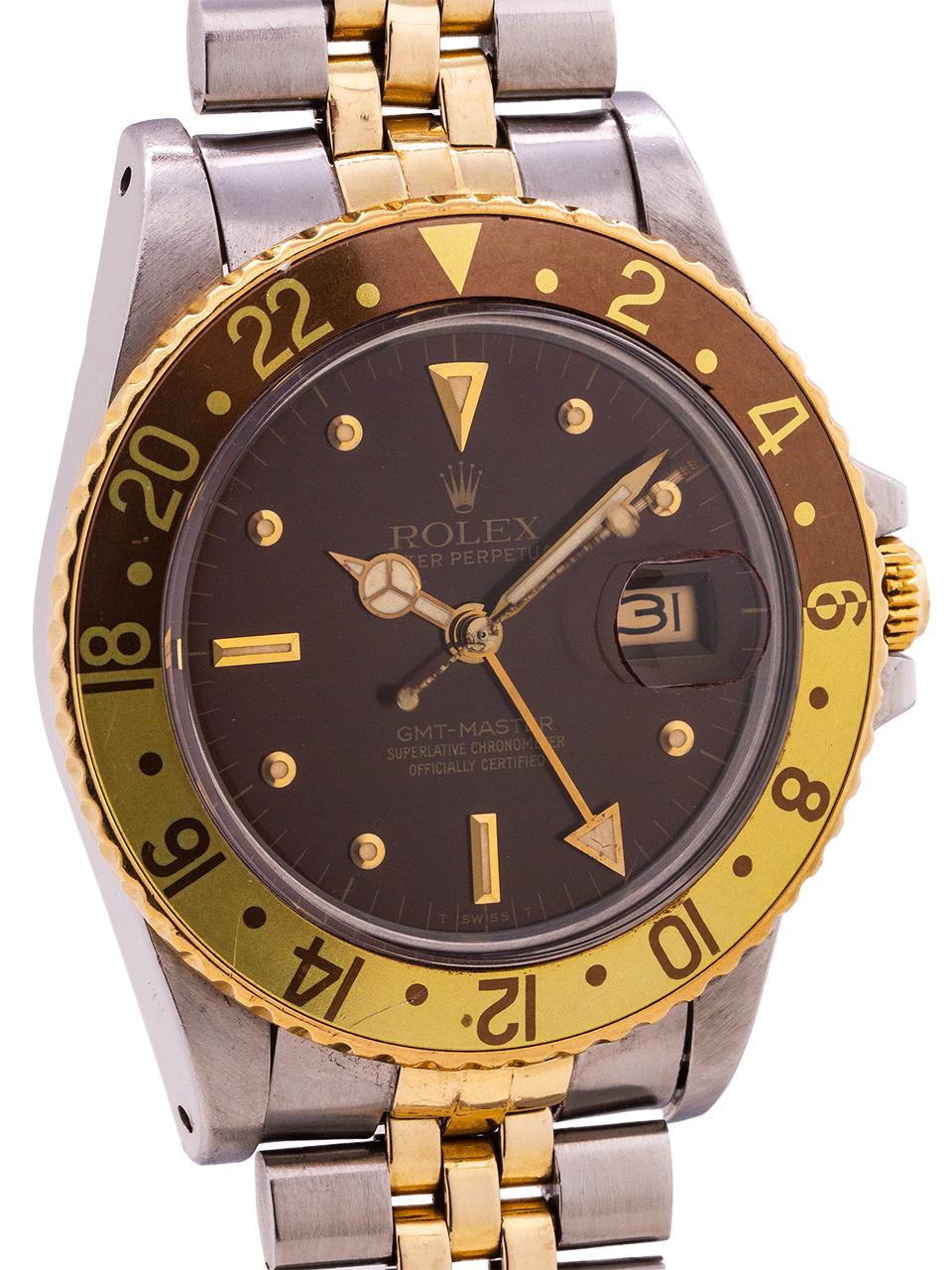 
Exceptional condition example Rolex GMT ref 16753 SS/18K YG case serial # 8.0 million circa 1981. Featuring 40mm diameter case with bi-directional 24 hour bronze and gold bezel, acrylic crystal, and original “root beer” dial with popular vintage