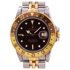 Rolex Yellow Gold Steel GMT Rootbeer dial self winding wristwatch, circa 1981