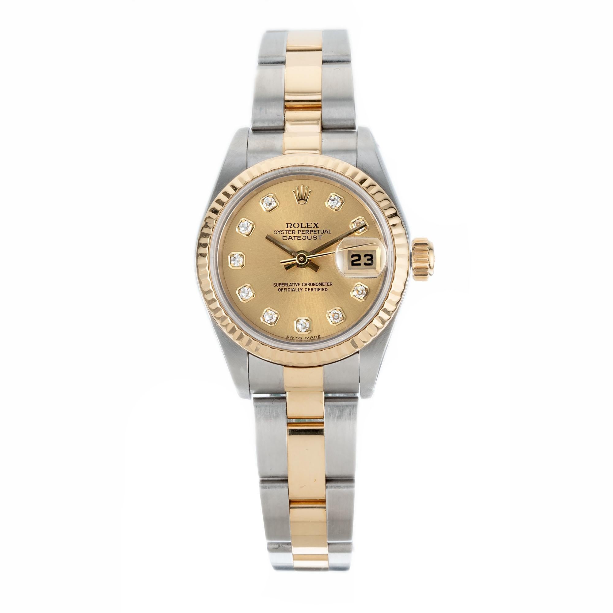 All factory original, ladies diamond dial Rolex Datejust, 18k yellow gold and steel. Fits a 7.5 Inch wrist and easily shortened. Original box and papers. 

Length: 33.15
Width: 26mm
Band width at case: 13mm
Case thickness: 10.68mm
Band: 2 tone