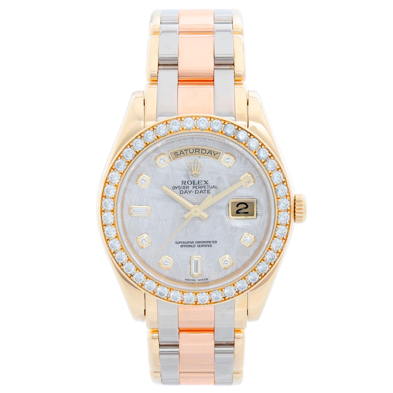 Automatic winding, 31 jewel, sapphire crystal. 18k yellow gold case with 40-diamond factory bezel (39mm diameter). Factory meteorite diamond dial. 18k yellow, white and rose/pink gold Tridor Masterpiece bracelet. Pre-owned with Rolex box and books.
