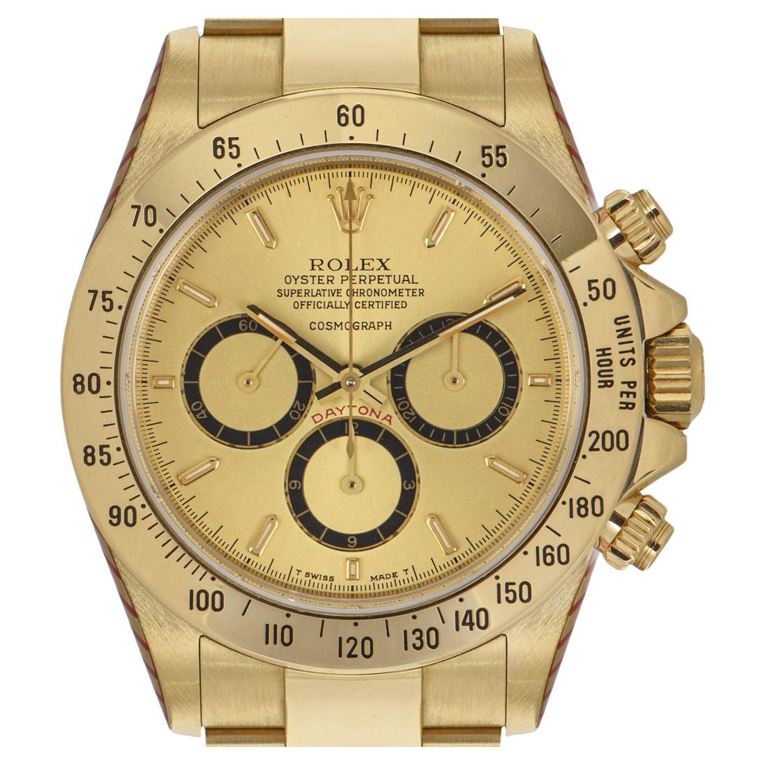 A unique R series Zenith Daytona crafted in yellow gold by Rolex. Features a champagne floating dial with applied hour markers and 3 sub dials featuring a 30 minute, a 12 hour, a small seconds recorder with a distinctive inverted 6. Complimenting