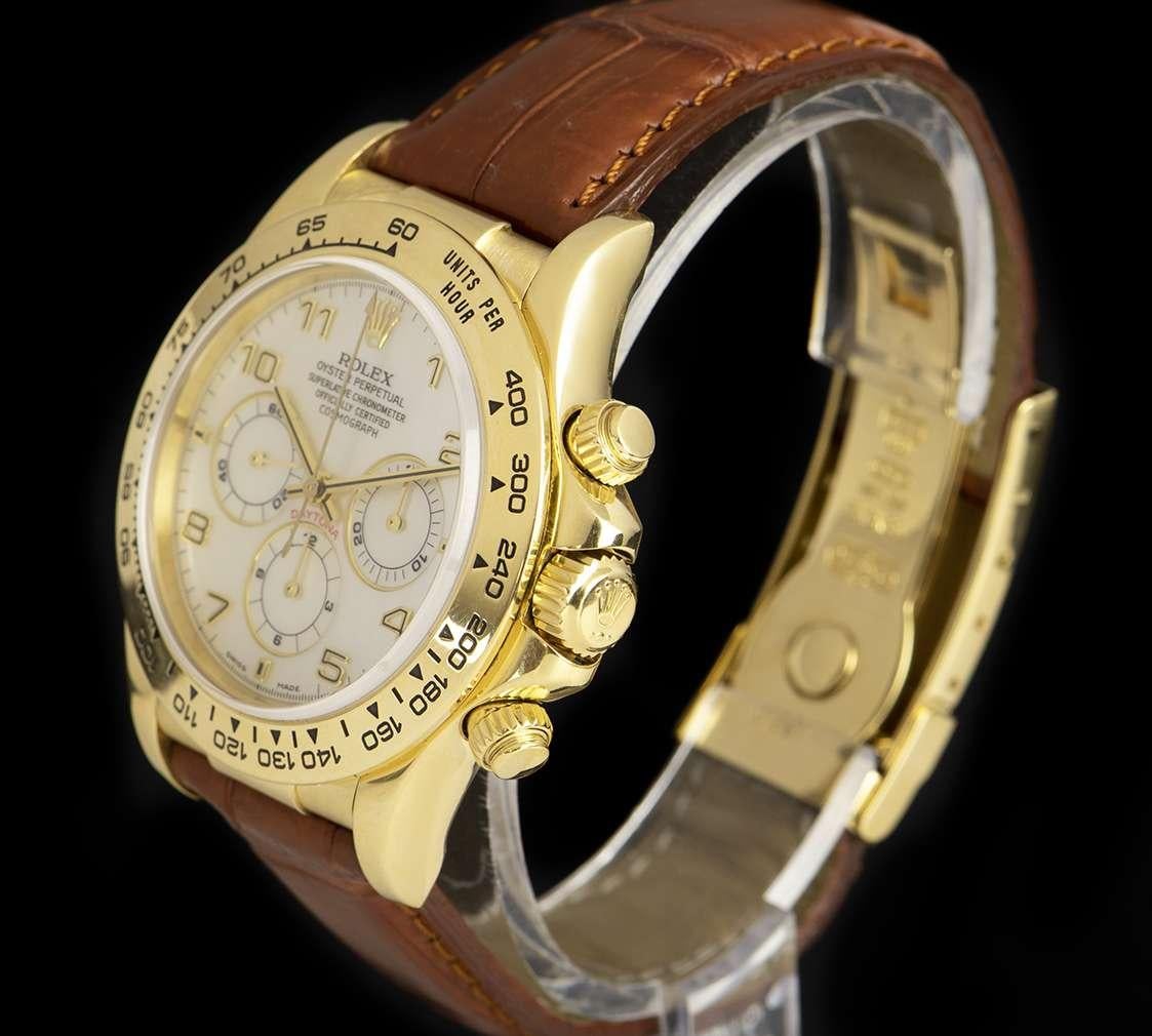 An 18k Yellow Gold Oyster Perpetual Zenith Movement Cosmograph Daytona Gents Wristwatch, white dial with applied arabic numbers and applied hour markers at 3, 6 and 9, 30 minute recorder at 3 0'clock, 12 hour recorder at 6 0'clock, small seconds at