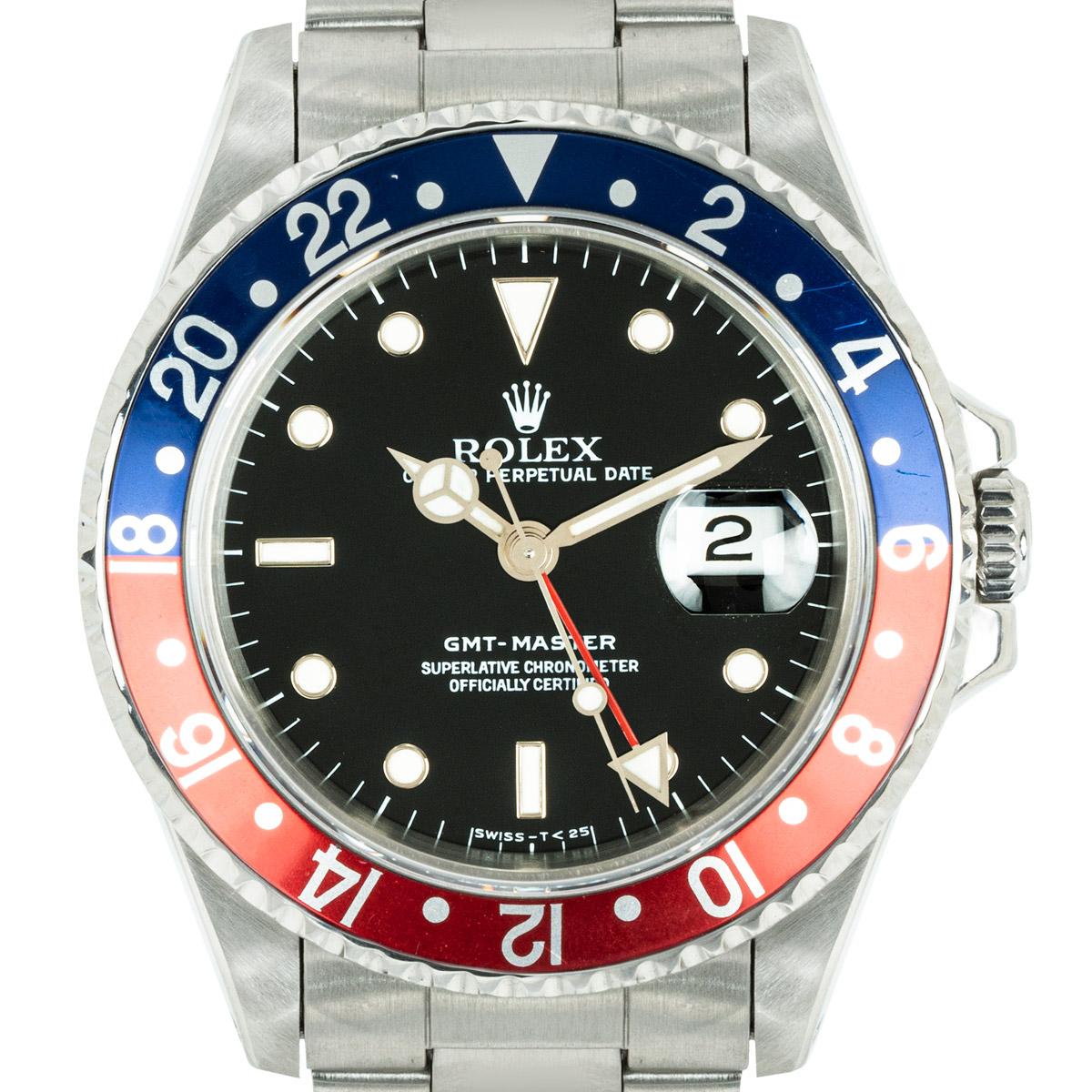 A stainless steel GMT-Master Pepsi wristwatch. Featuring a black dial with applied hour markers, a date aperture and a red second-time zone hand. Complimenting the dial is a stainless steel bi-directional rotating bezel which features a blue and red
