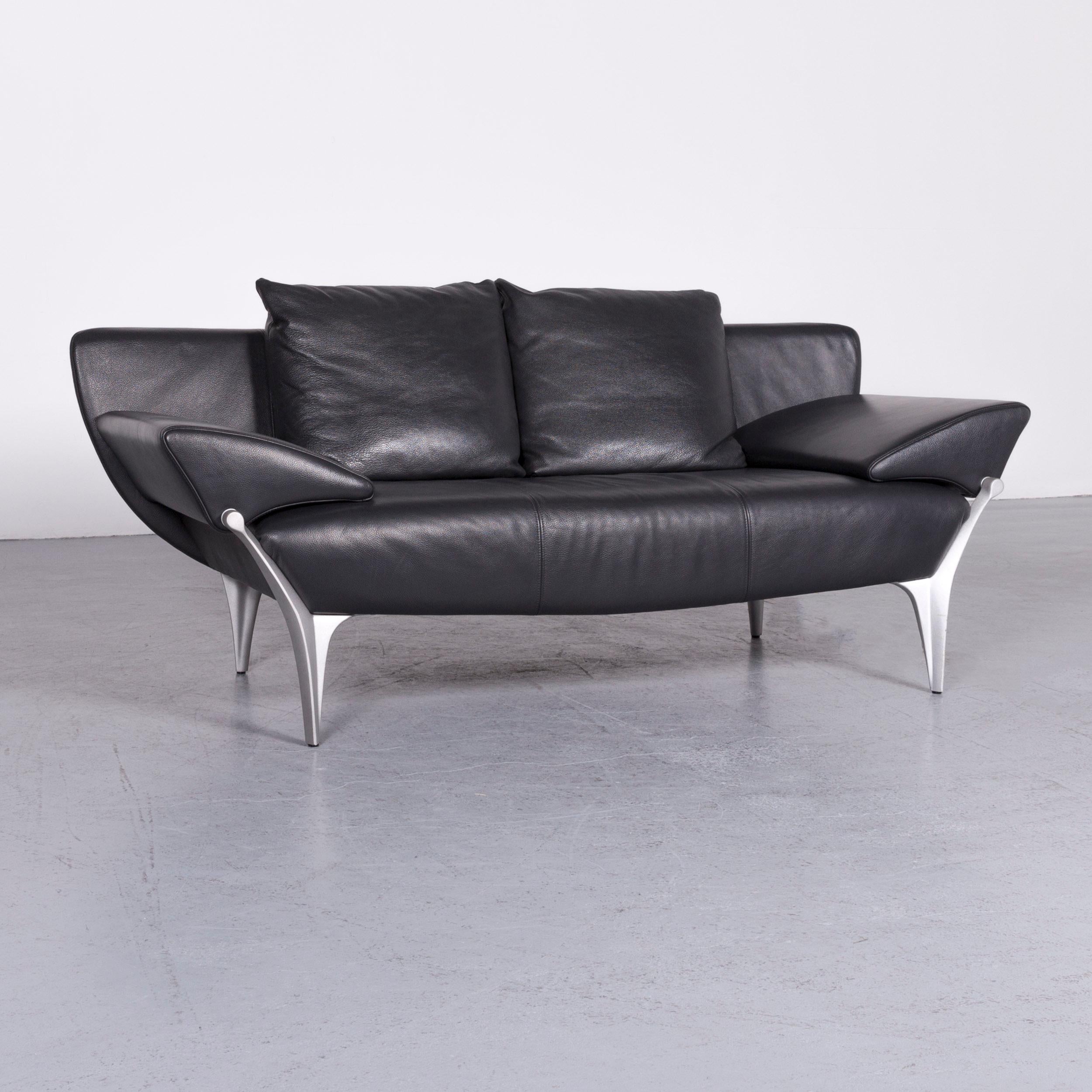 We bring to you a Rolf Benz 1600 designer leather sofa black two-seat couch.