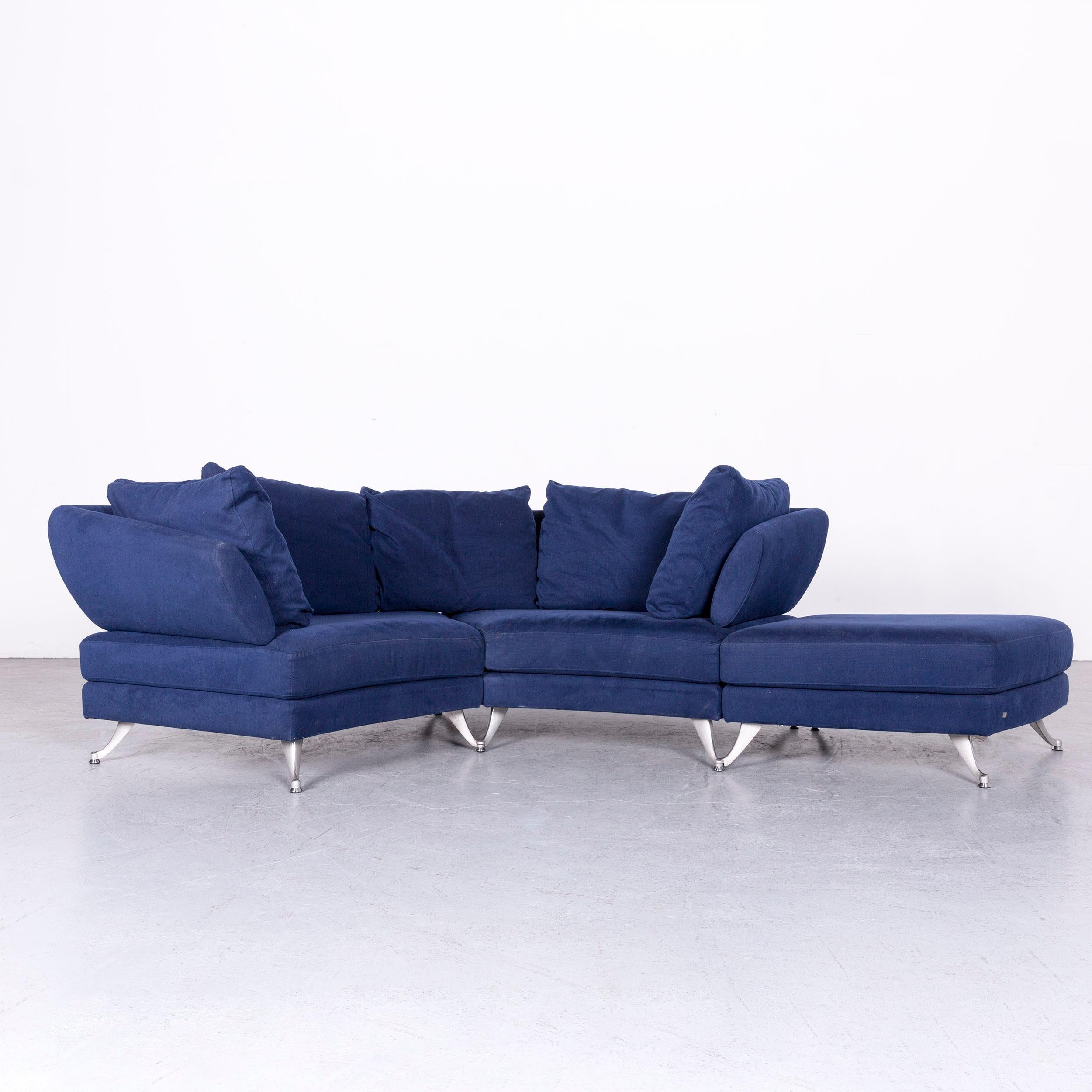 We bring to you a Rolf Benz 222 designer sofa blue fabric three-seat corner couch.