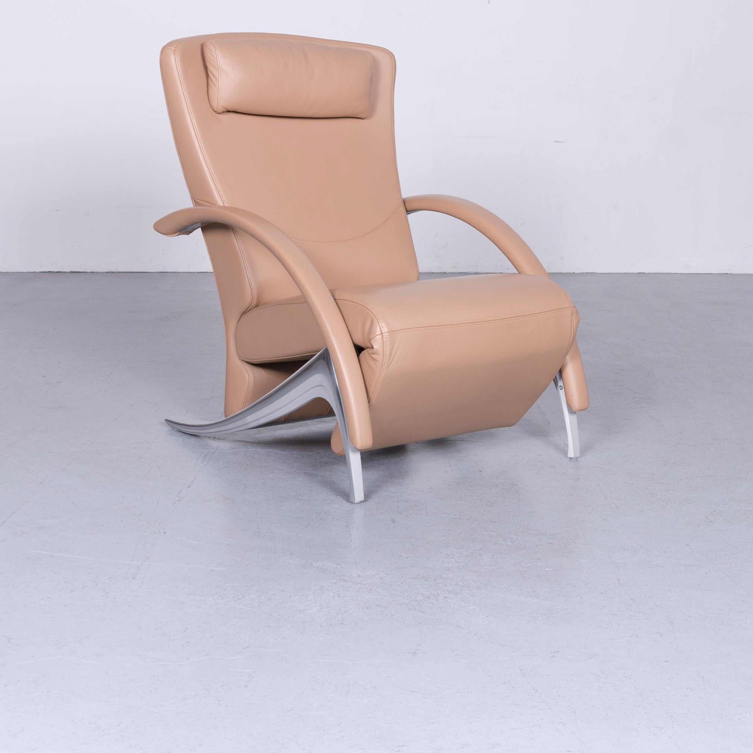 We bring to you a Rolf Benz 3100 designer leather armchair beige chair with function.