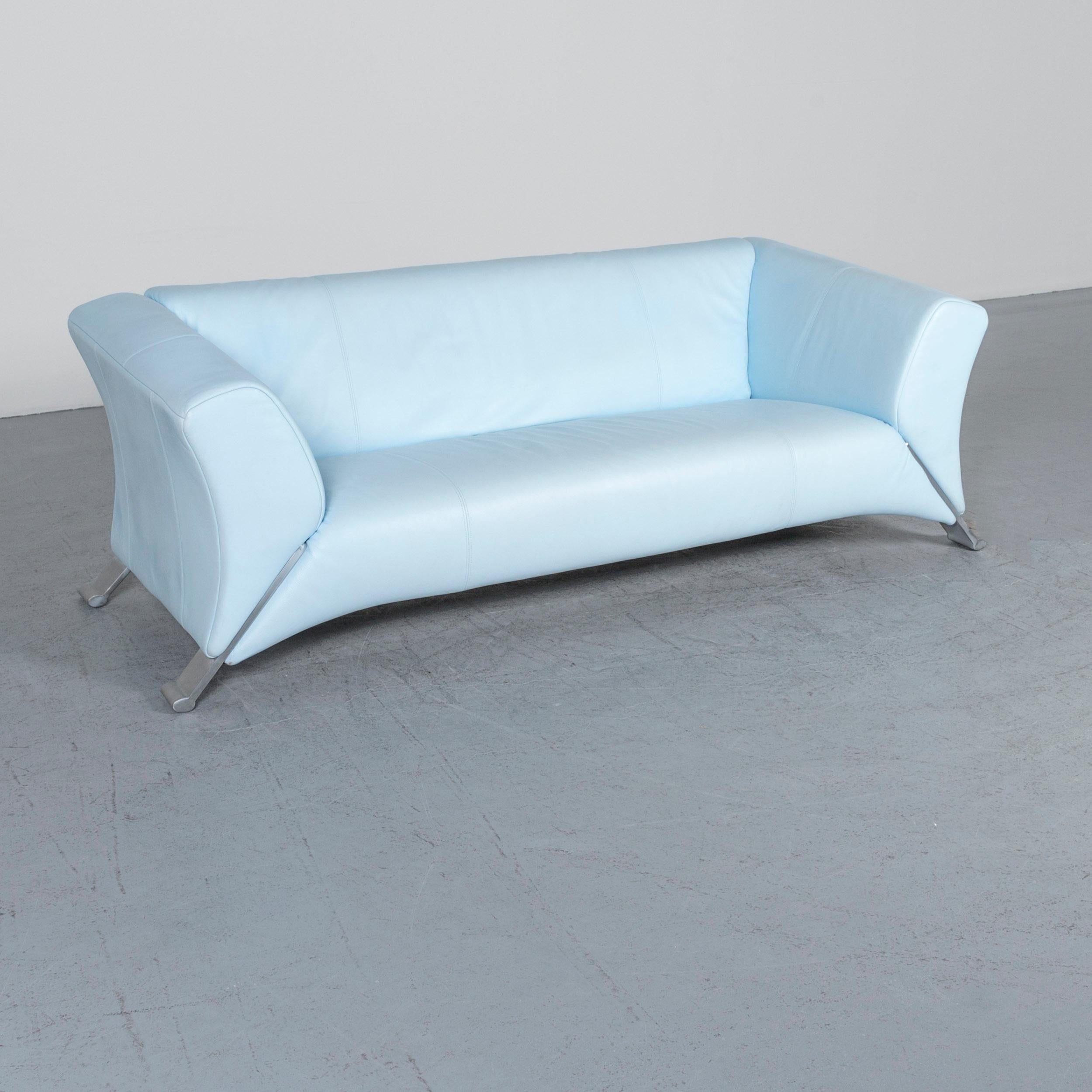 We bring to you a Rolf Benz 322 designer sofa blue two-seat leather couch.