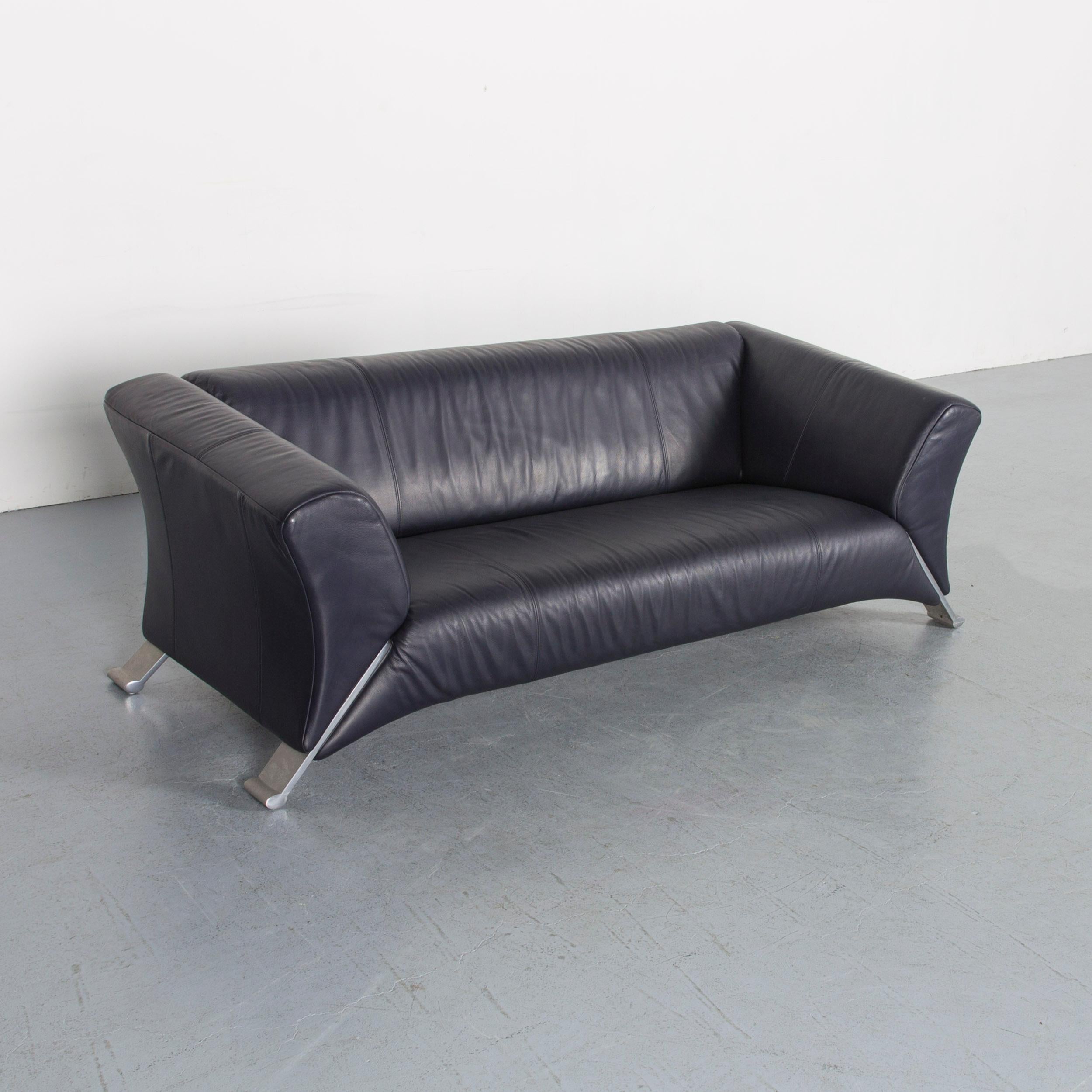 We bring to you an Rolf Benz 322 designer sofa dark blue three-seat leather modern couch.