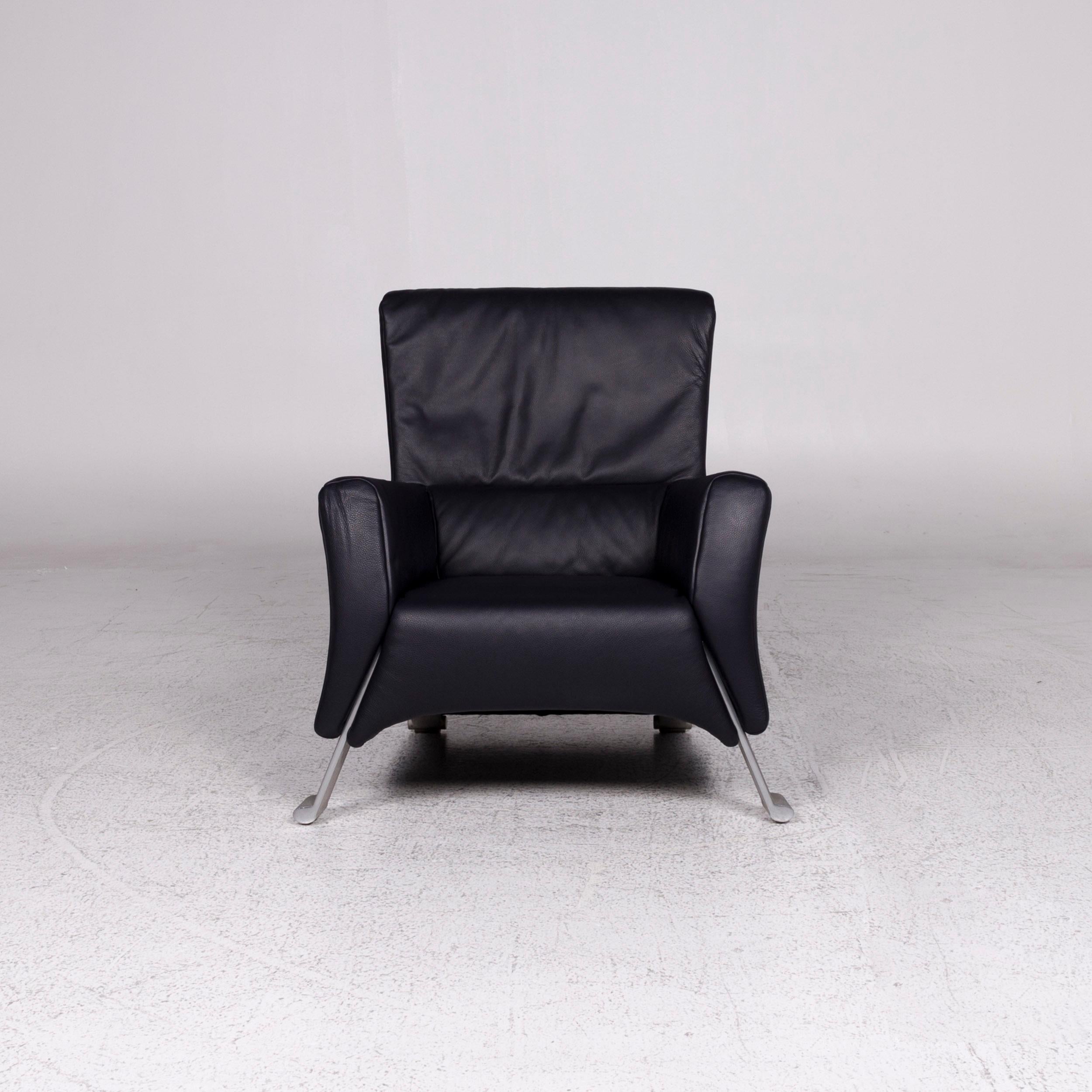 We bring to you a Rolf Benz 322 leather armchair incl. Stool dark blue.
 
 Product measurements in centimeters:
 
Depth 84
Width 86
Height 91
Seat-height 40
Rest-height 58
Seat-depth 49
Seat-width 46
Back-height 45.
 