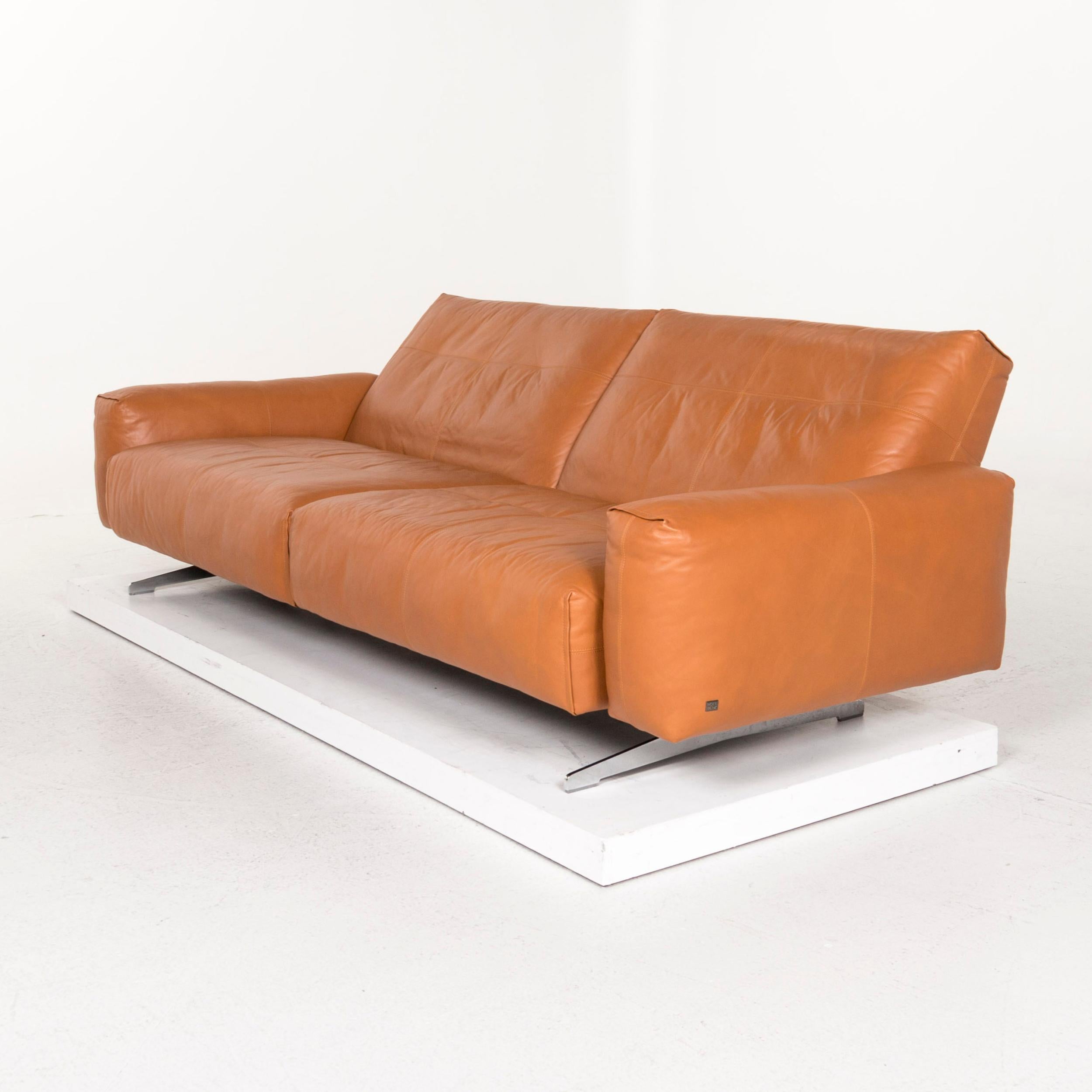 We bring to you a Rolf Benz 50 leather sofa cognac brown three-seat couch.


 Product measurements in centimeters:
 

Depth 106
Width 256
Height 80
Seat-height 41
Rest-height 54
Seat-depth 71
Seat-width 211
Back-height 39.
 