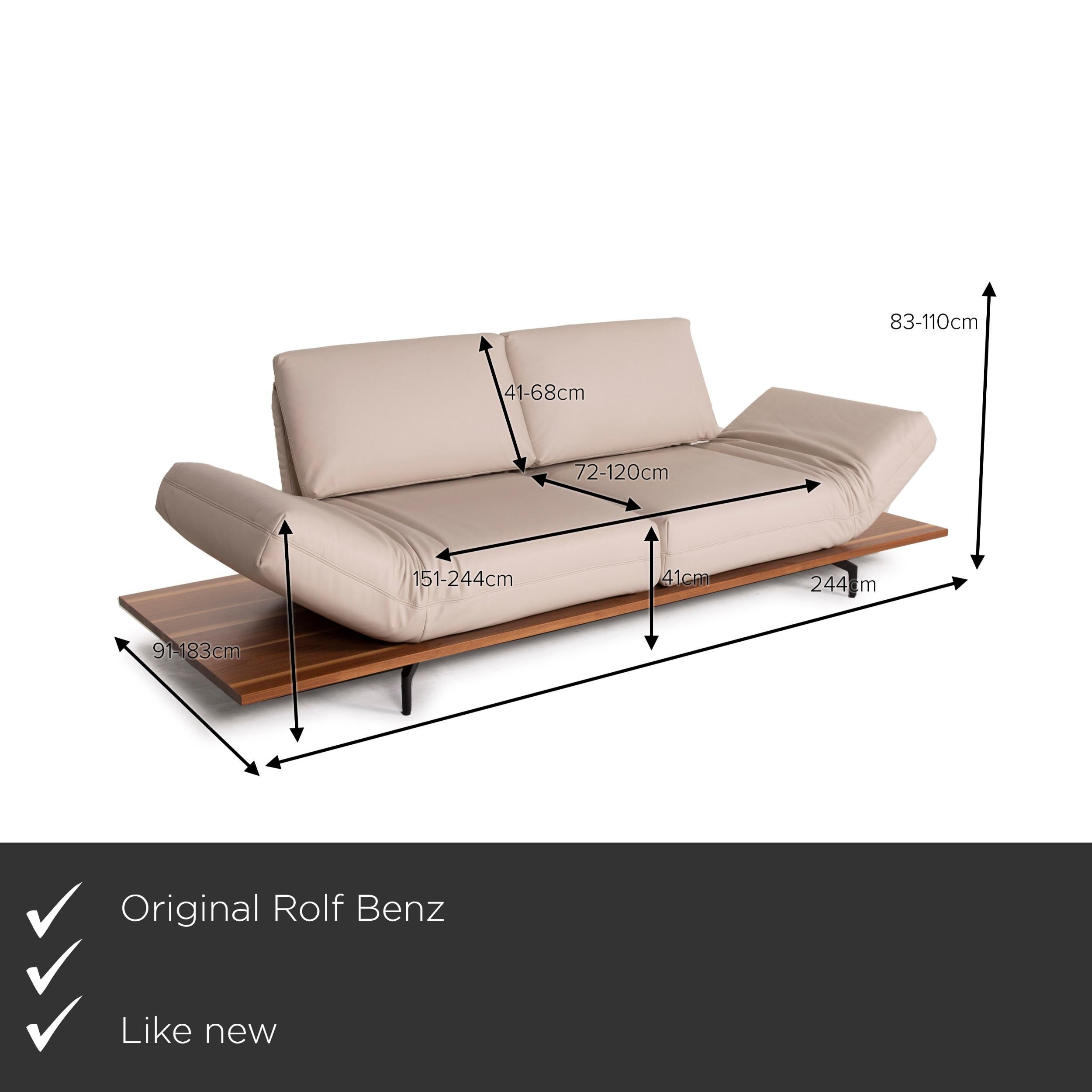 We present to you a Rolf Benz Aura leather sofa cream two-seater function, reclining function, wood.


 Product measurements in centimeters:
 

Depth: 91
Width: 244
Height: 83
Seat height: 41
Rest height: 67
Seat depth: 72
Seat width: