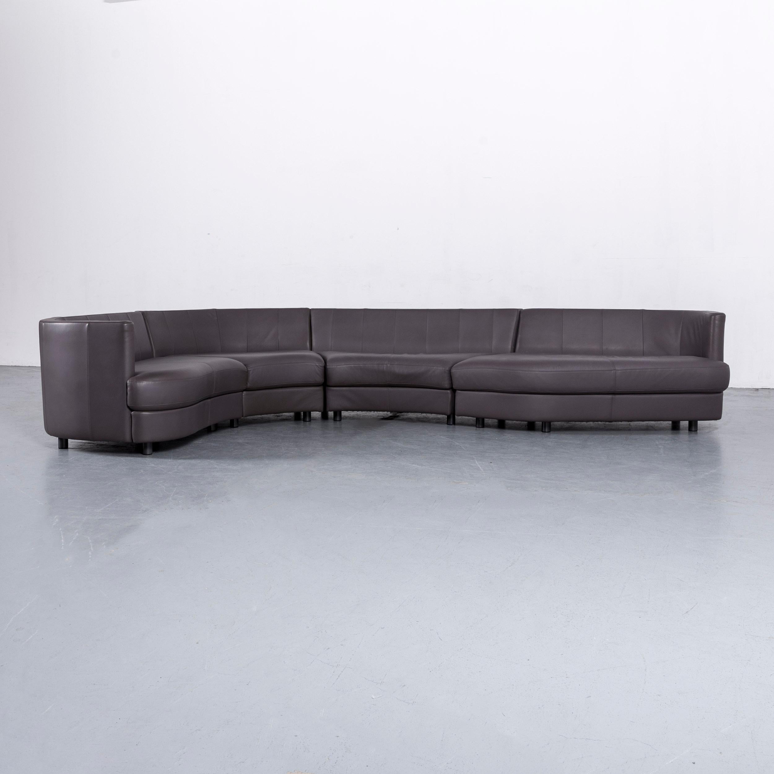 We bring to you an Rolf Benz designer leather corner sofa set grey purple and bench.