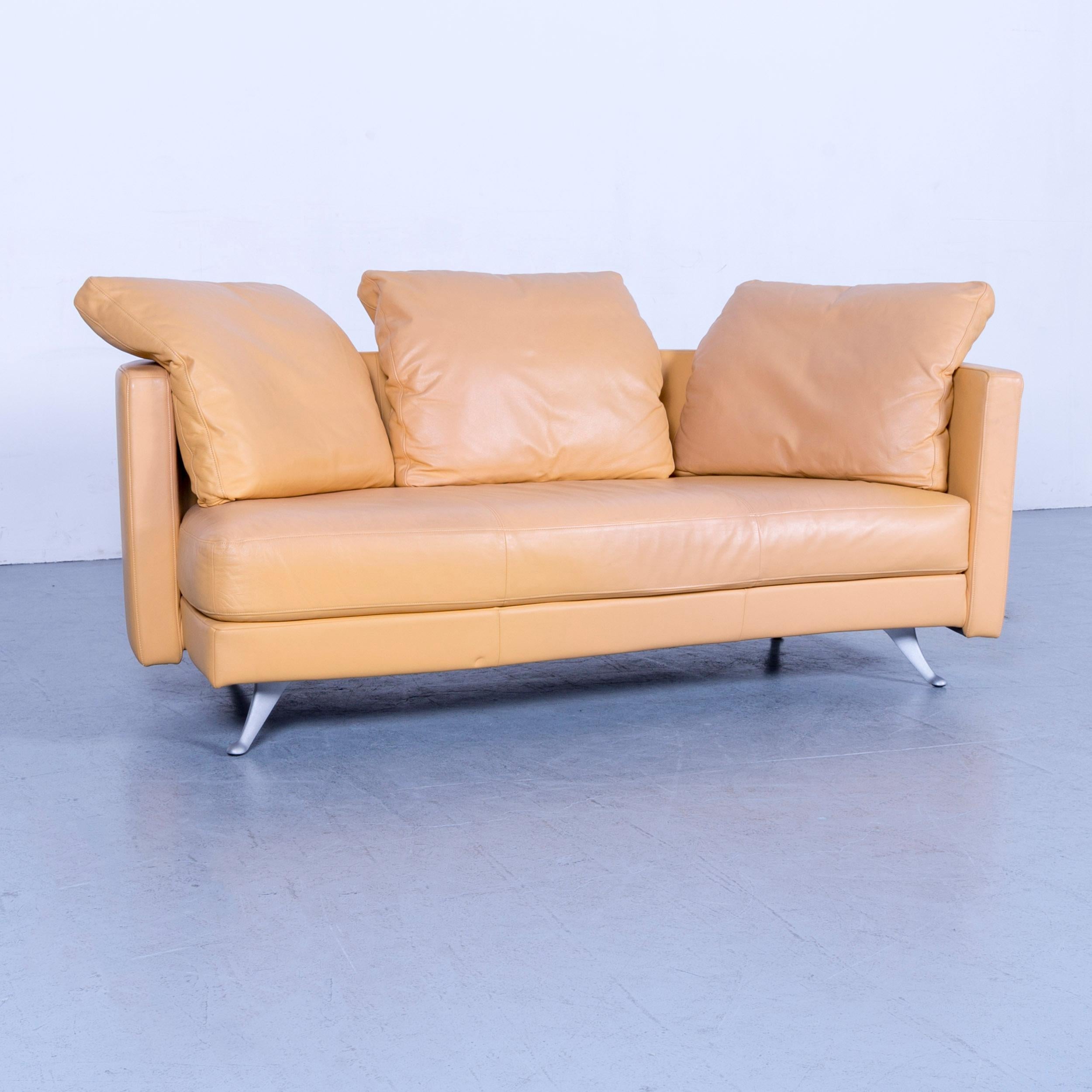 We bring to you an Rolf Benz designer leather sofa set beige two-seat couch and bench.