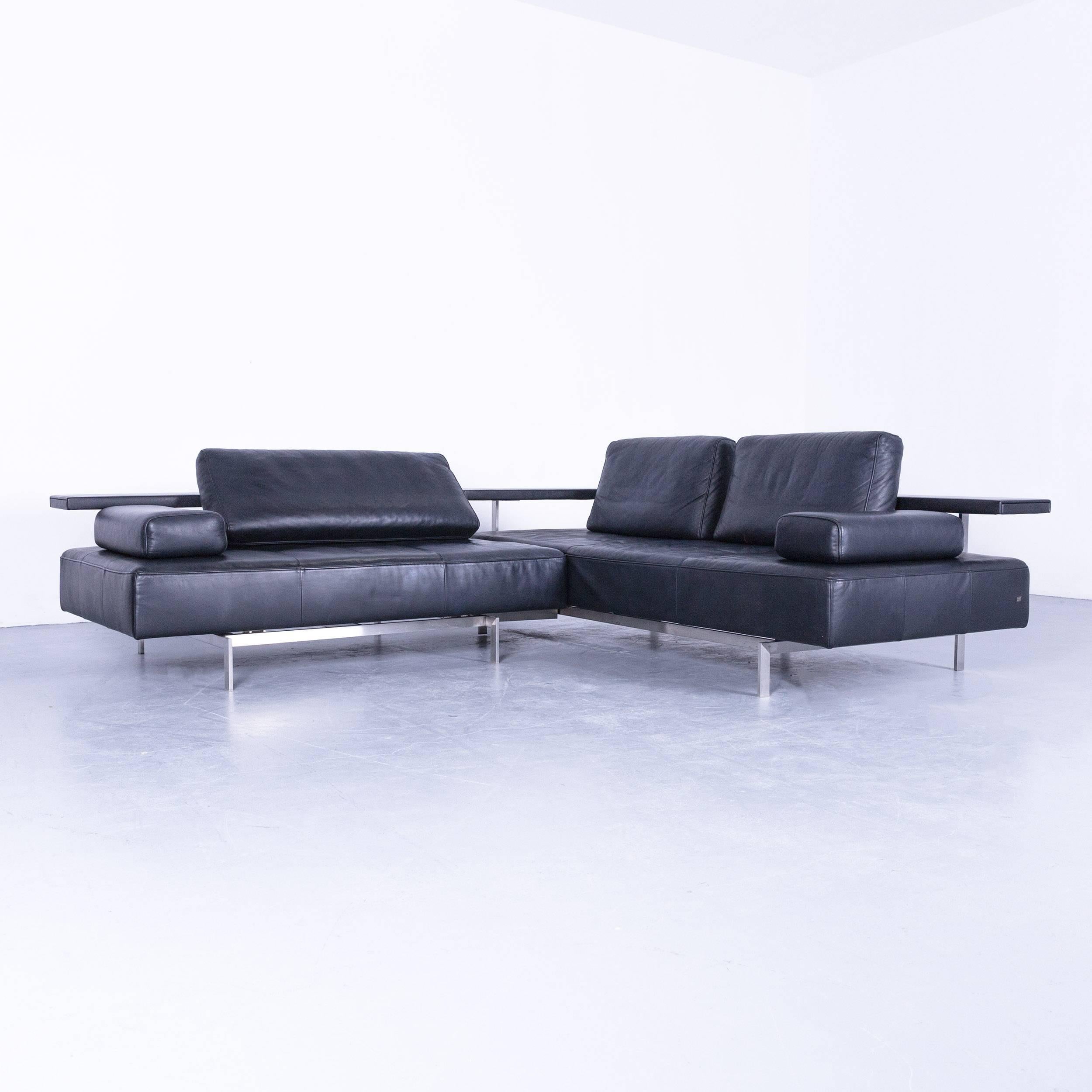 Rolf Benz Dono designer corner sofa with footstool in dark blue leather. Couch modern, in a minimalistic and modern design, made in Germany for pure comfort.