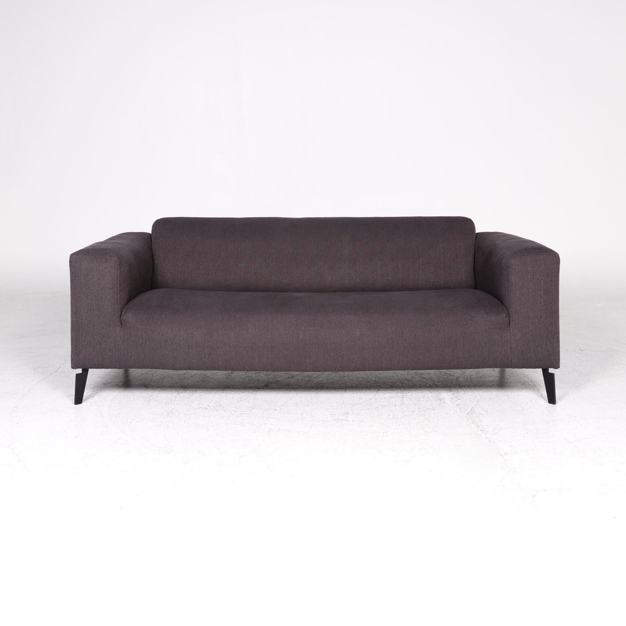 We bring to you a Rolf Benz fabric sofa anthracite three-seat couch.

 Product measurements in centimeters:
 
Depth: 91
Width: 204
Height: 73
Seat-height: 43
Rest-height: 66
Seat-depth: 62
Seat-width: 156
Back-height: 34.

 