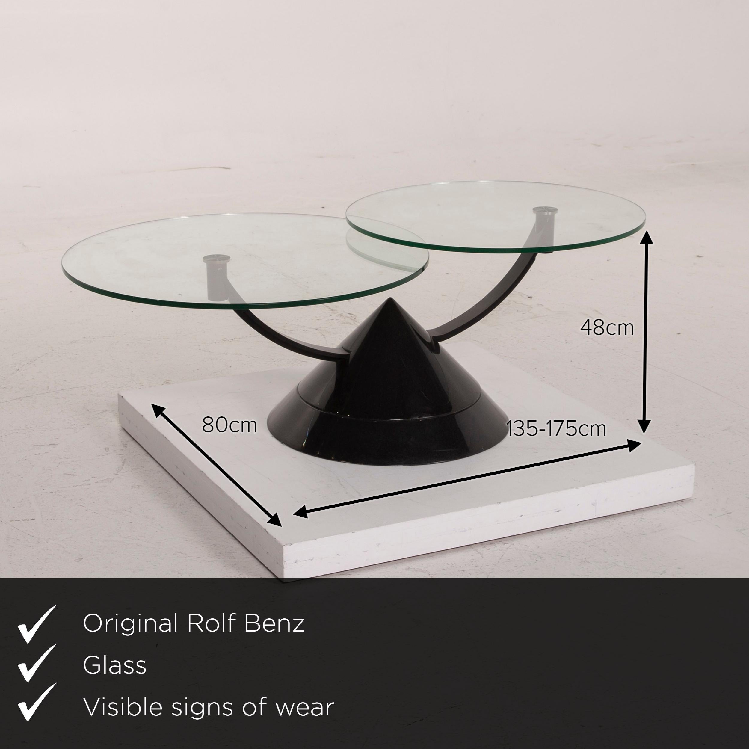We present to you a Rolf Benz glass table black coffee table stone outlet adjustable.


 Product measurements in centimeters:
 

 Depth 80
 Width 135
 Height 48.





 
