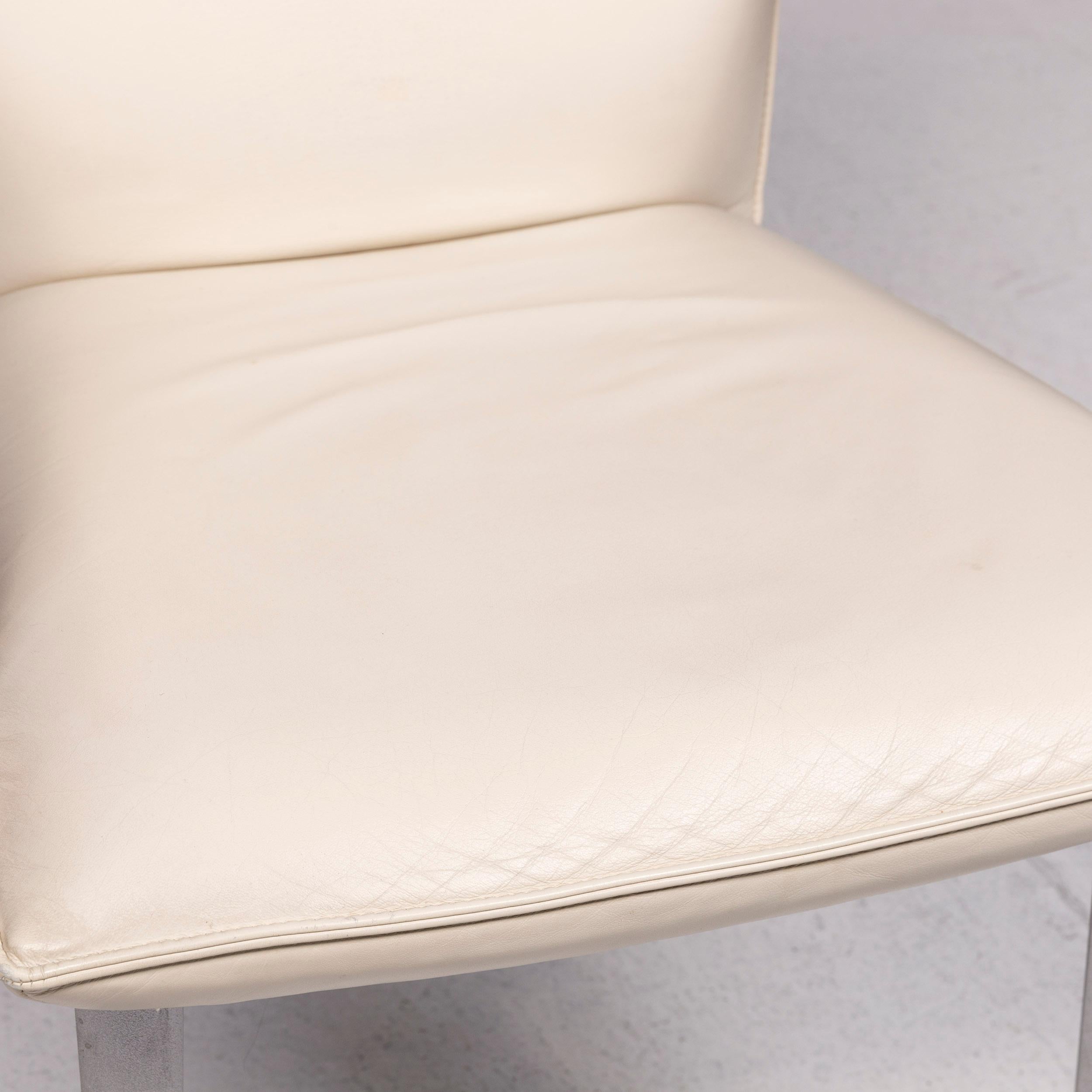 We bring to you a Rolf Benz leather chair cream armchair.


 Product measurements in centimeters:
 

Depth 65
Width 62
Height 99
Seat-height 47
Rest-height 70
Seat-depth 46
Seat-width 53
Back-height 50.
 